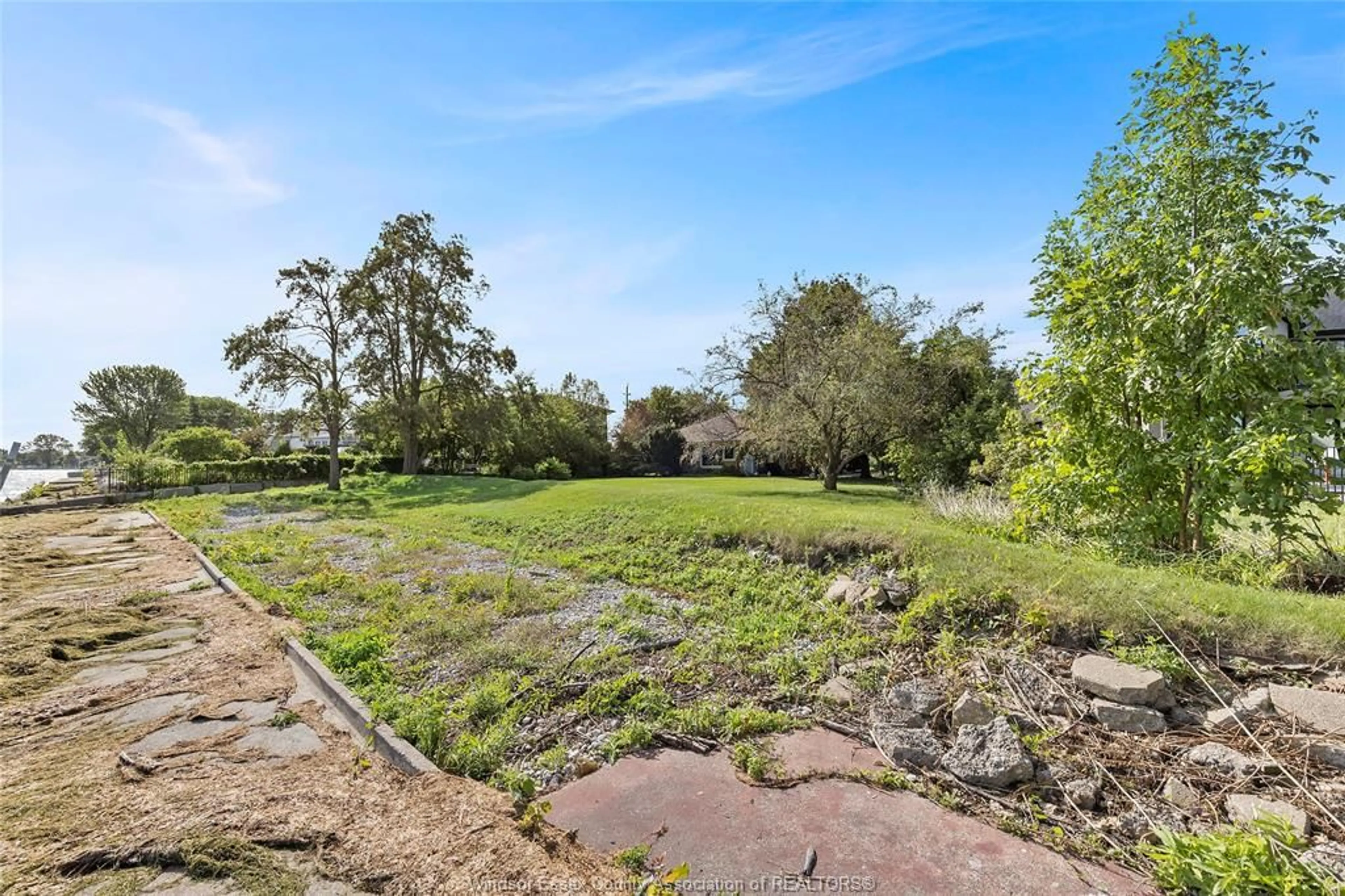 A pic from outside/outdoor area/front of a property/back of a property/a pic from drone, water/lake/river/ocean view for 11280 RIVERSIDE Dr, Windsor Ontario N8P 1A4