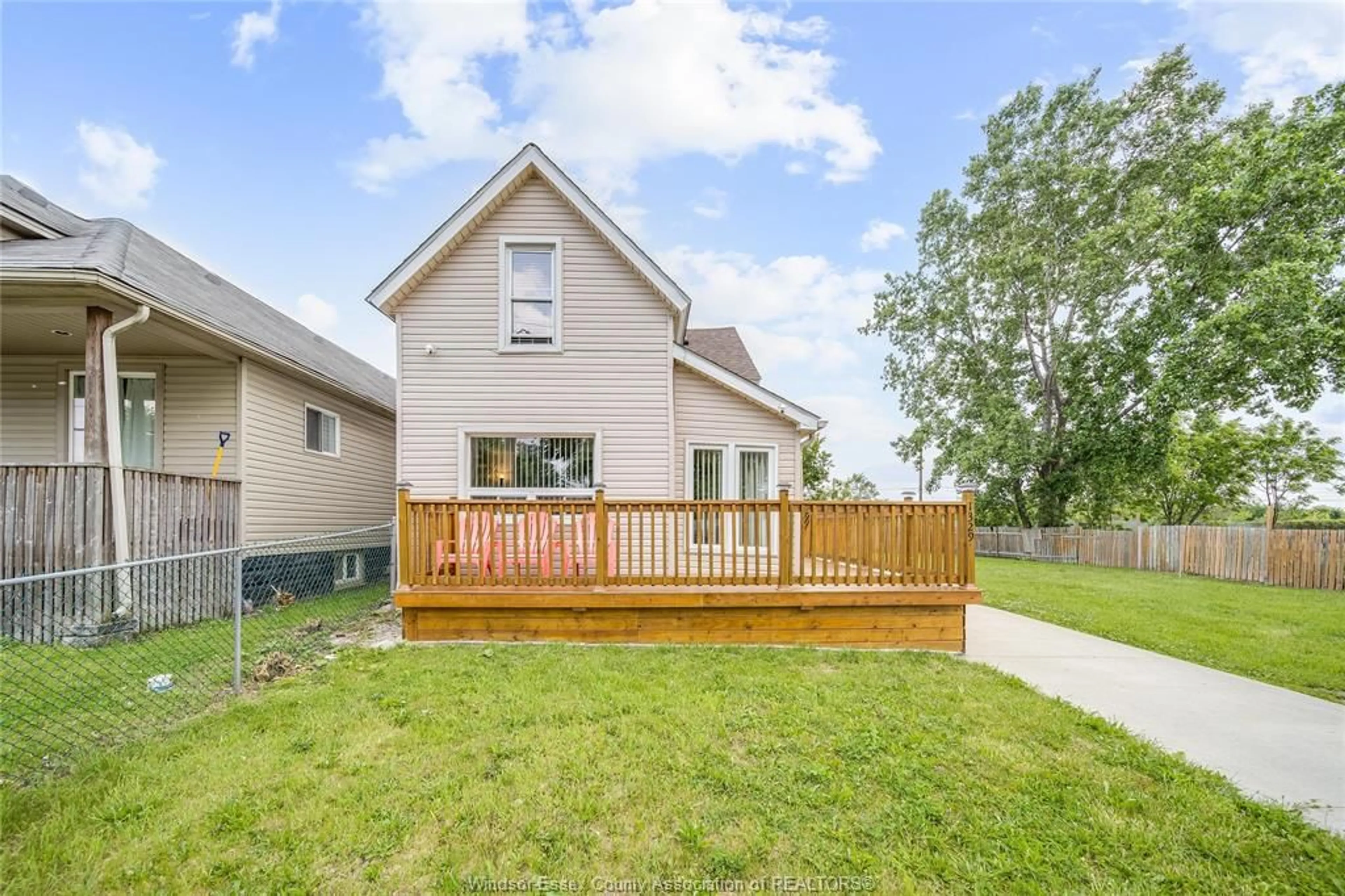 Home with vinyl exterior material, street for 1329 WELLINGTON, Windsor Ontario N8X 2C1