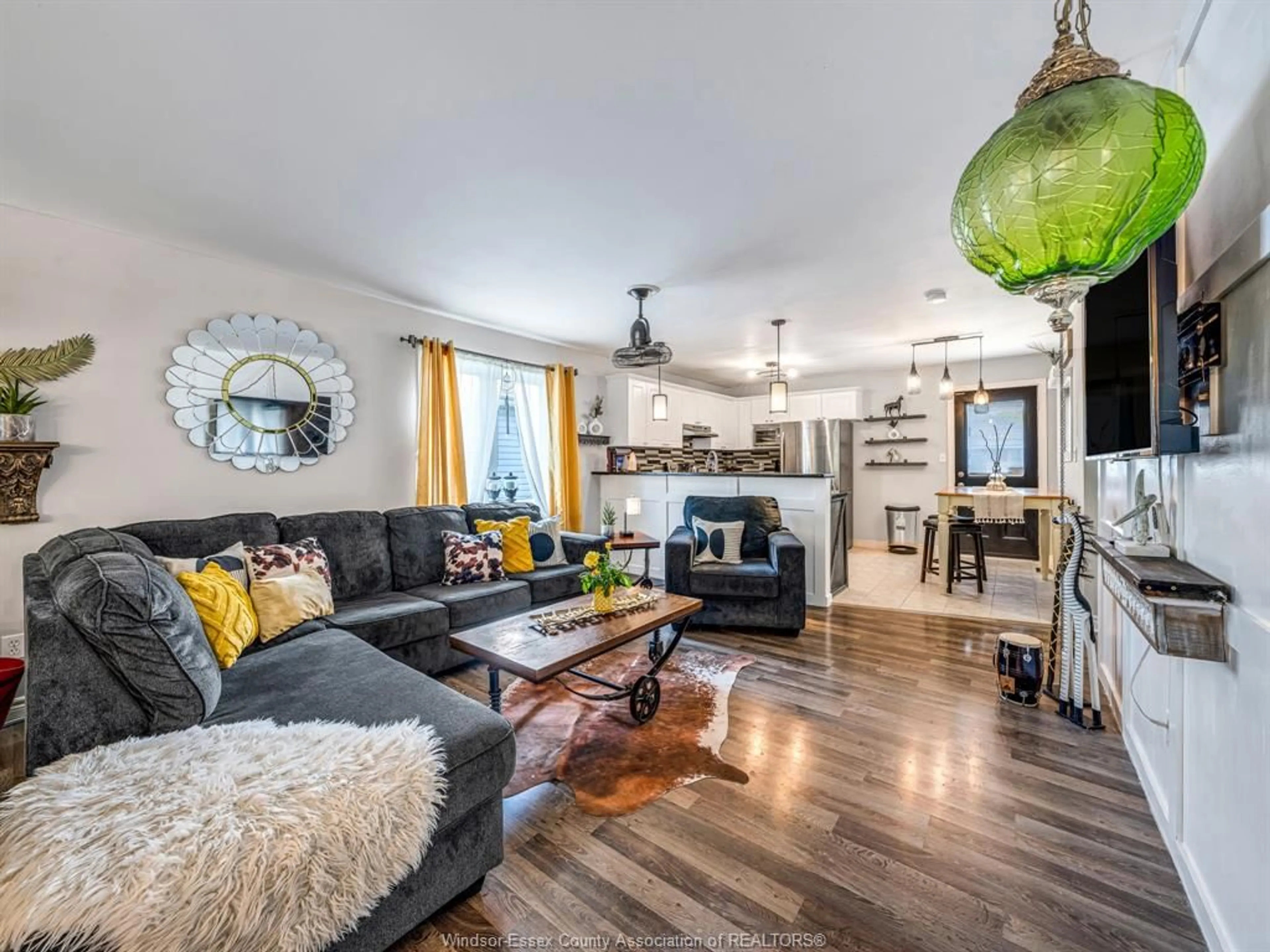 Living room with furniture, wood/laminate floor for 2535 LUXURY Ave, Windsor Ontario N8P 1S8
