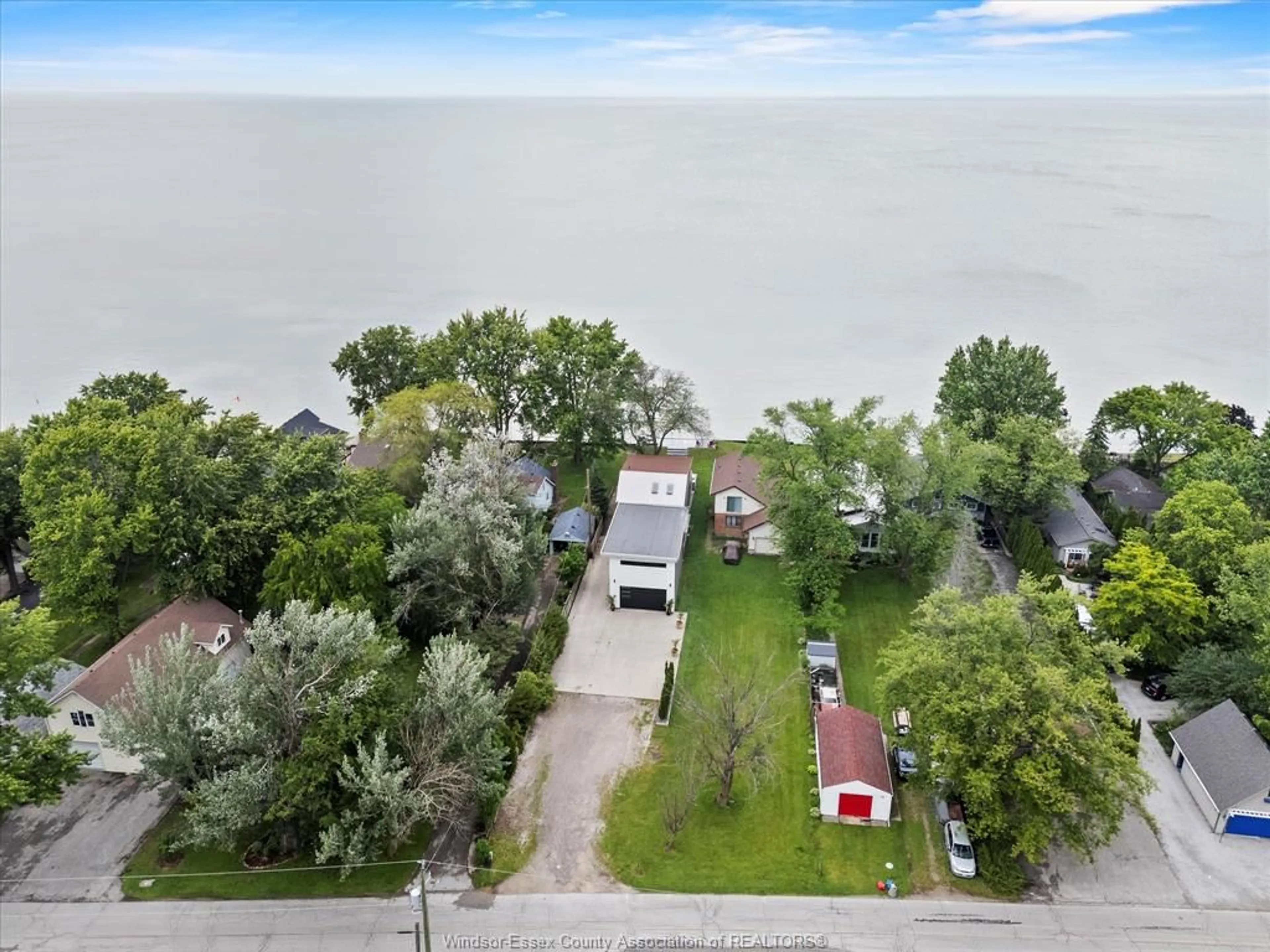 A pic from outside/outdoor area/front of a property/back of a property/a pic from drone, water/lake/river/ocean view for 1674 CAILLE Ave, Lakeshore Ontario N8L 0J4