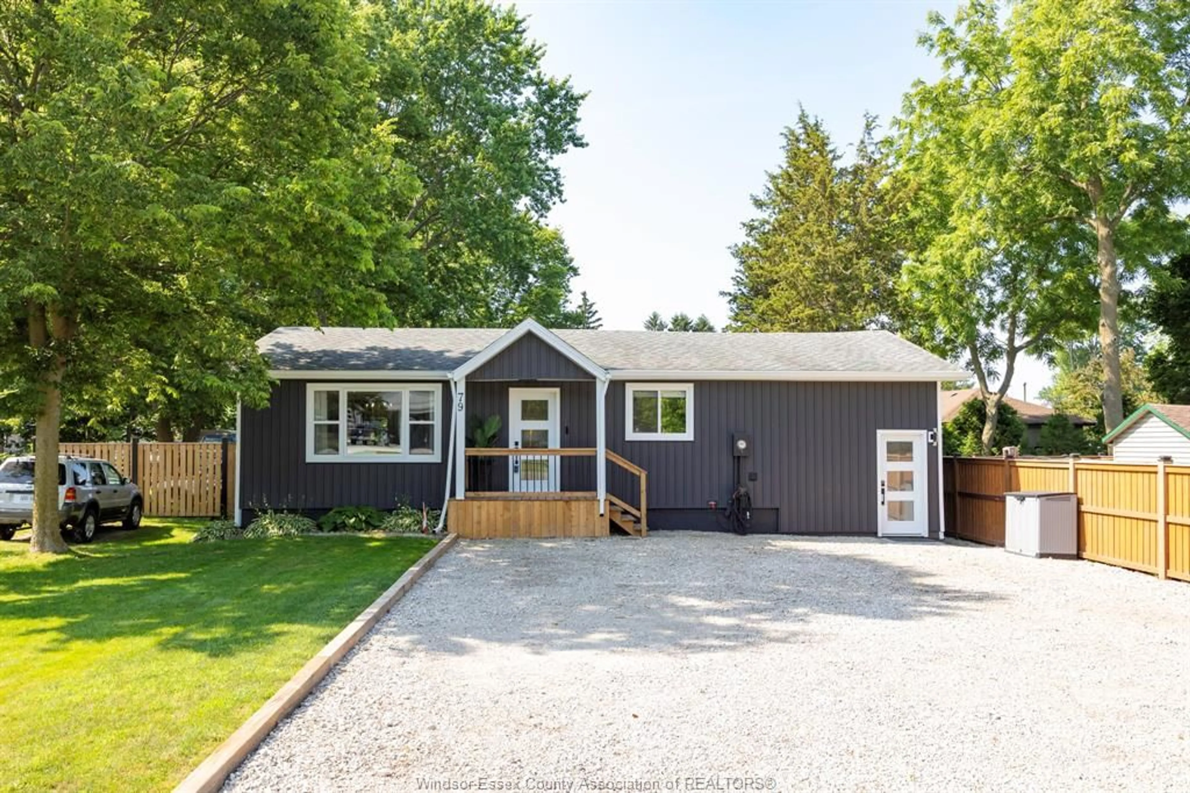 Home with vinyl exterior material, street for 79 County Road 50, Colchester Ontario N0R 1G0