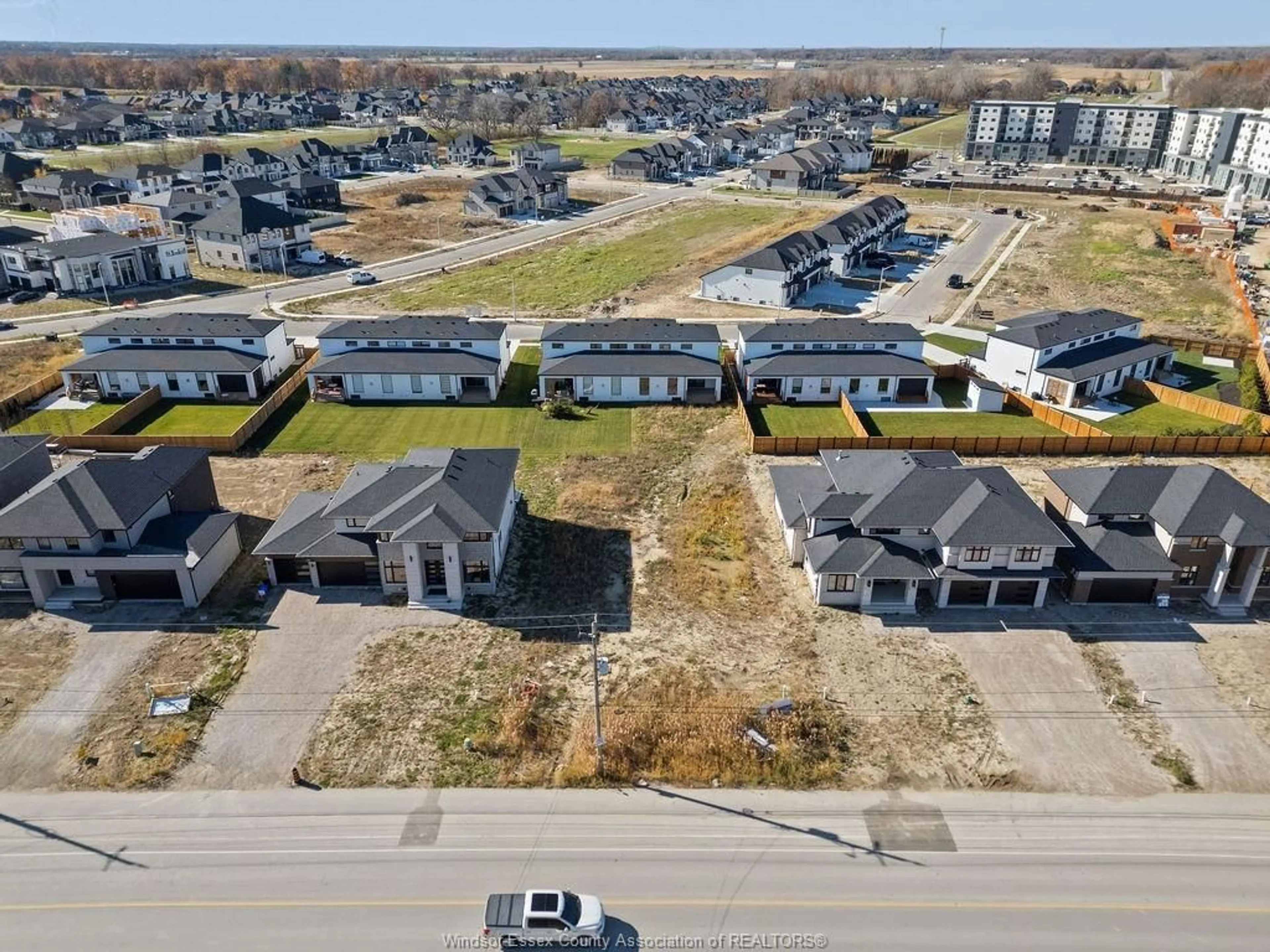 A pic from outside/outdoor area/front of a property/back of a property/a pic from drone, street for 5113 HURON CHURCH LINE, LaSalle Ontario N9H 0N2