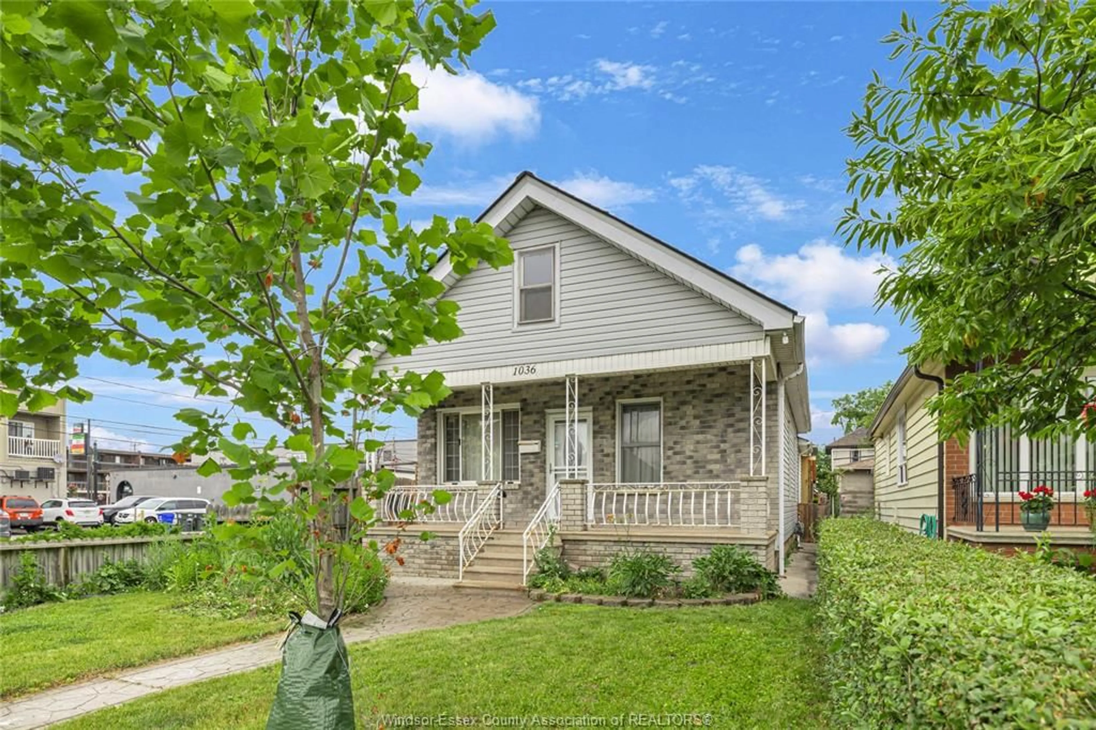 Home with vinyl exterior material, street for 1036 MARENTETTE Ave, Windsor Ontario N9A 2A5