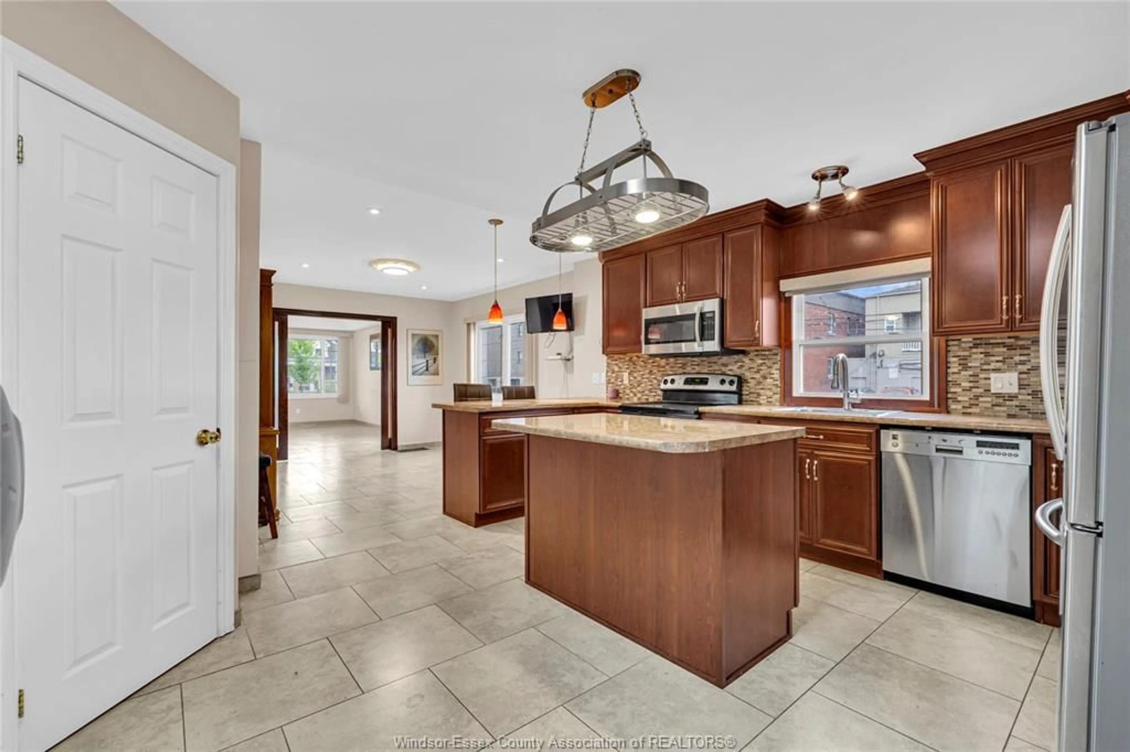 Open concept kitchen, ceramic/tile floor for 1036 MARENTETTE Ave, Windsor Ontario N9A 2A5