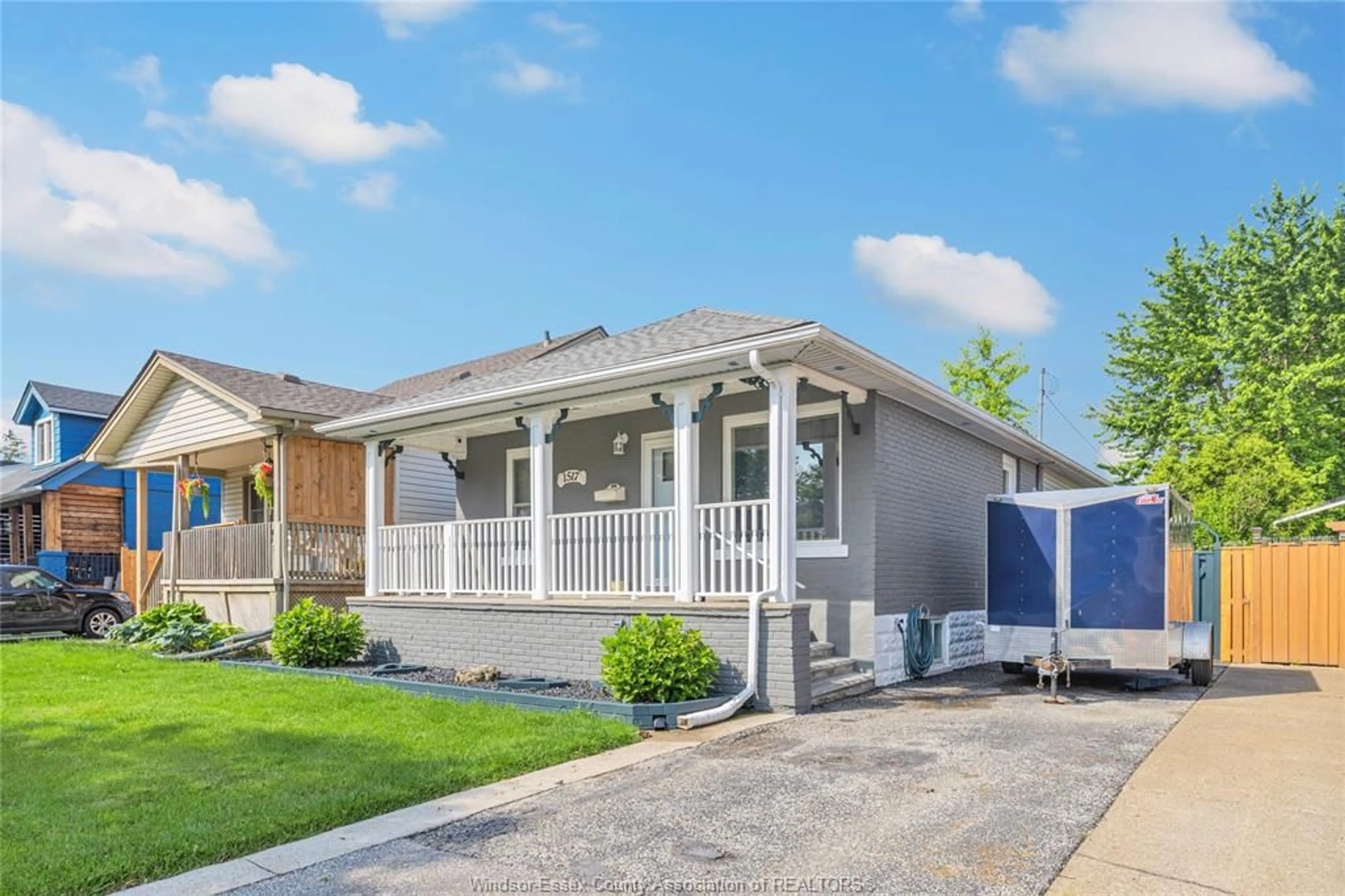 Home with vinyl exterior material, street for 1517 BERNARD Rd, Windsor Ontario N8Y 4K5
