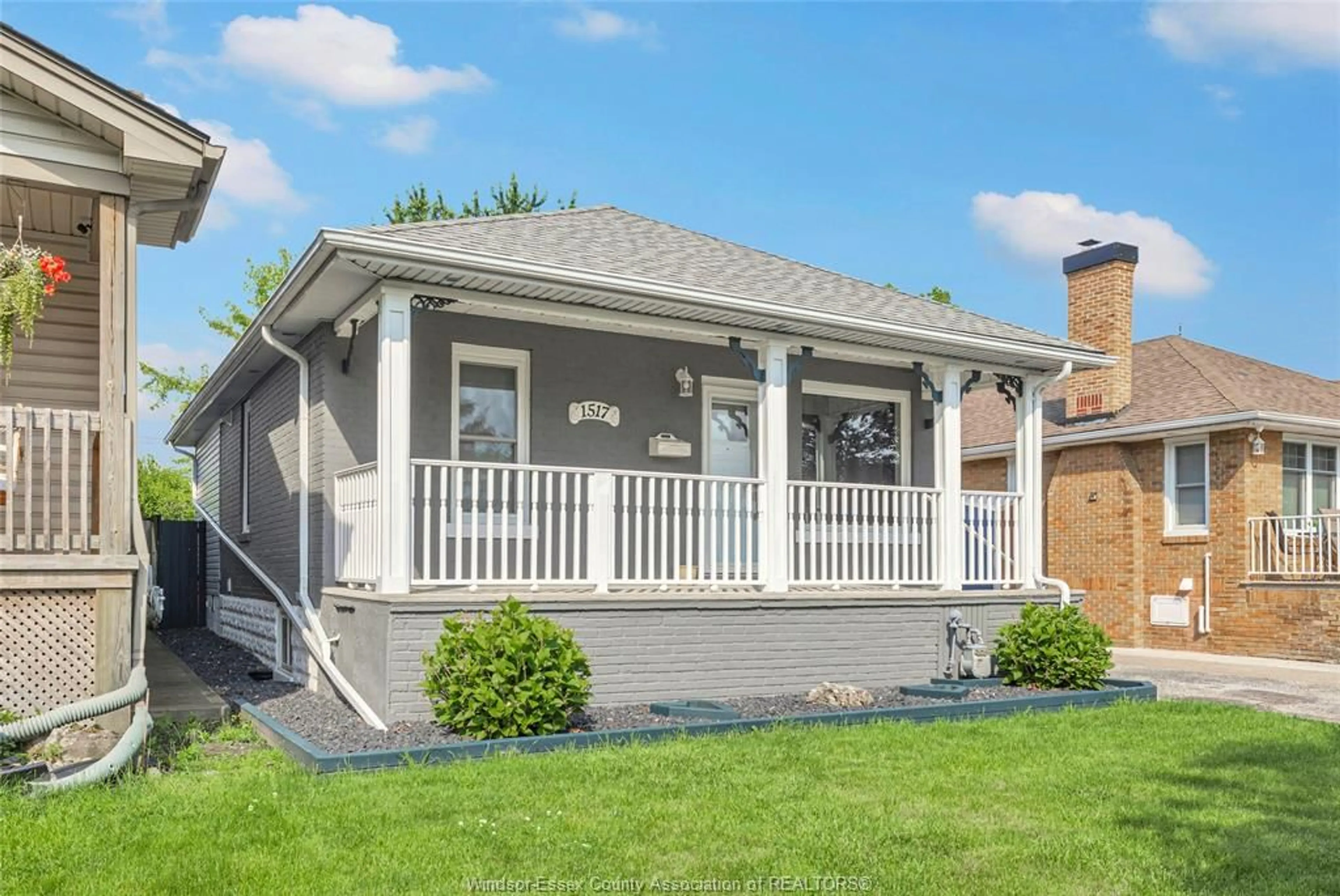 Home with vinyl exterior material, street for 1517 BERNARD Rd, Windsor Ontario N8Y 4K5