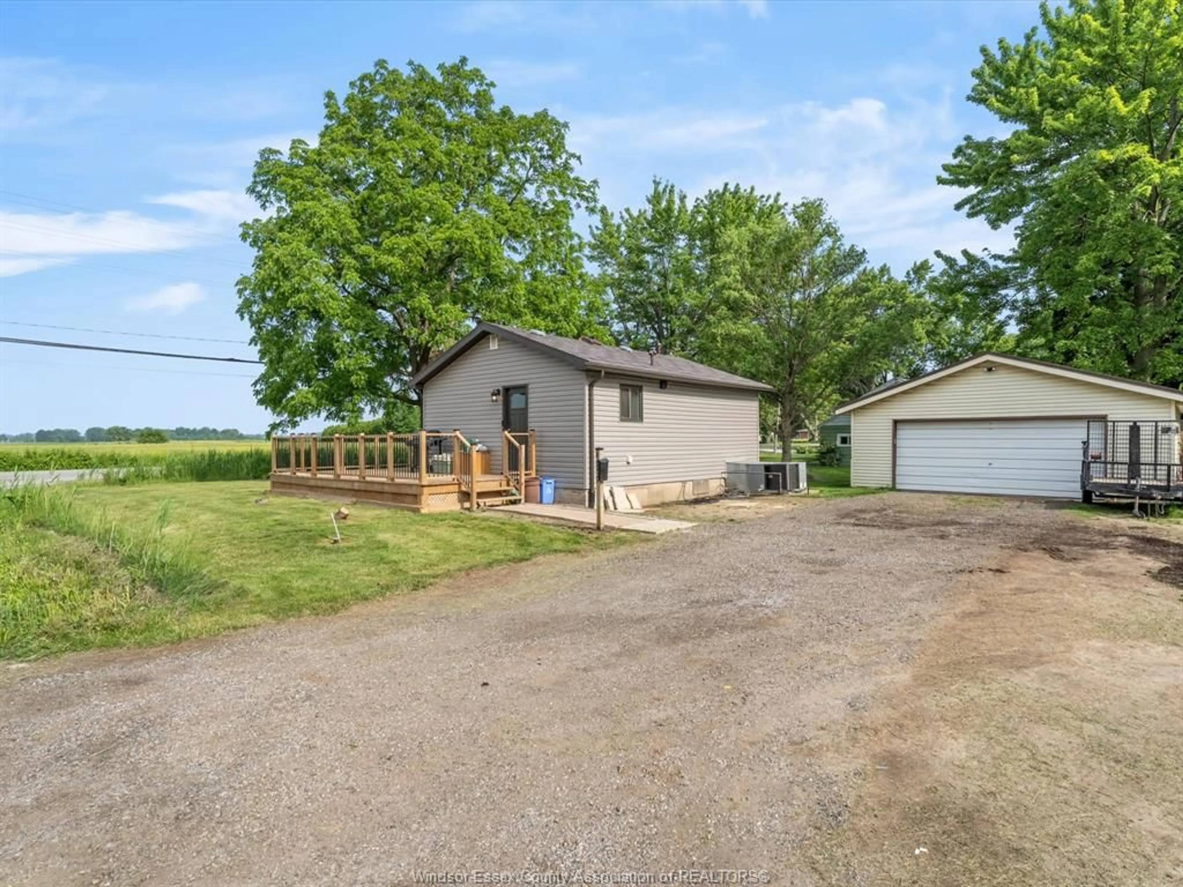 A pic from outside/outdoor area/front of a property/back of a property/a pic from drone, street for 8650 Malden Rd, LaSalle Ontario N9J 2V7