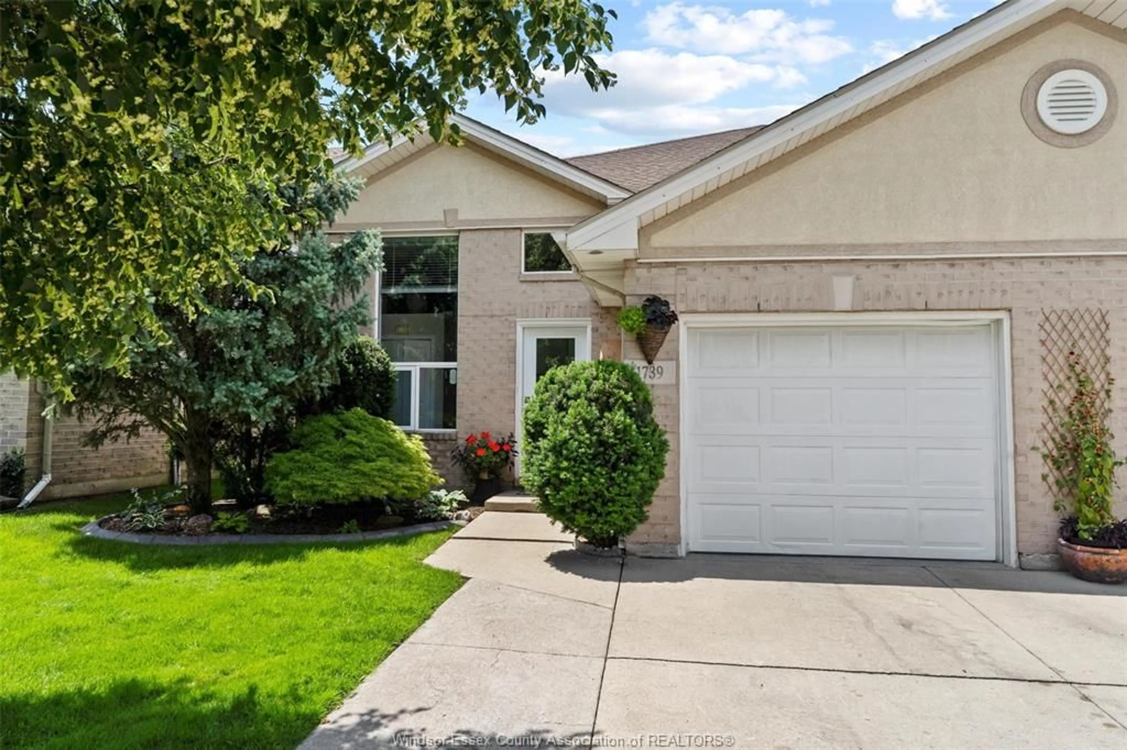Home with vinyl exterior material, street for 1739 CASTLEON Ave, Windsor Ontario N8P 1P5