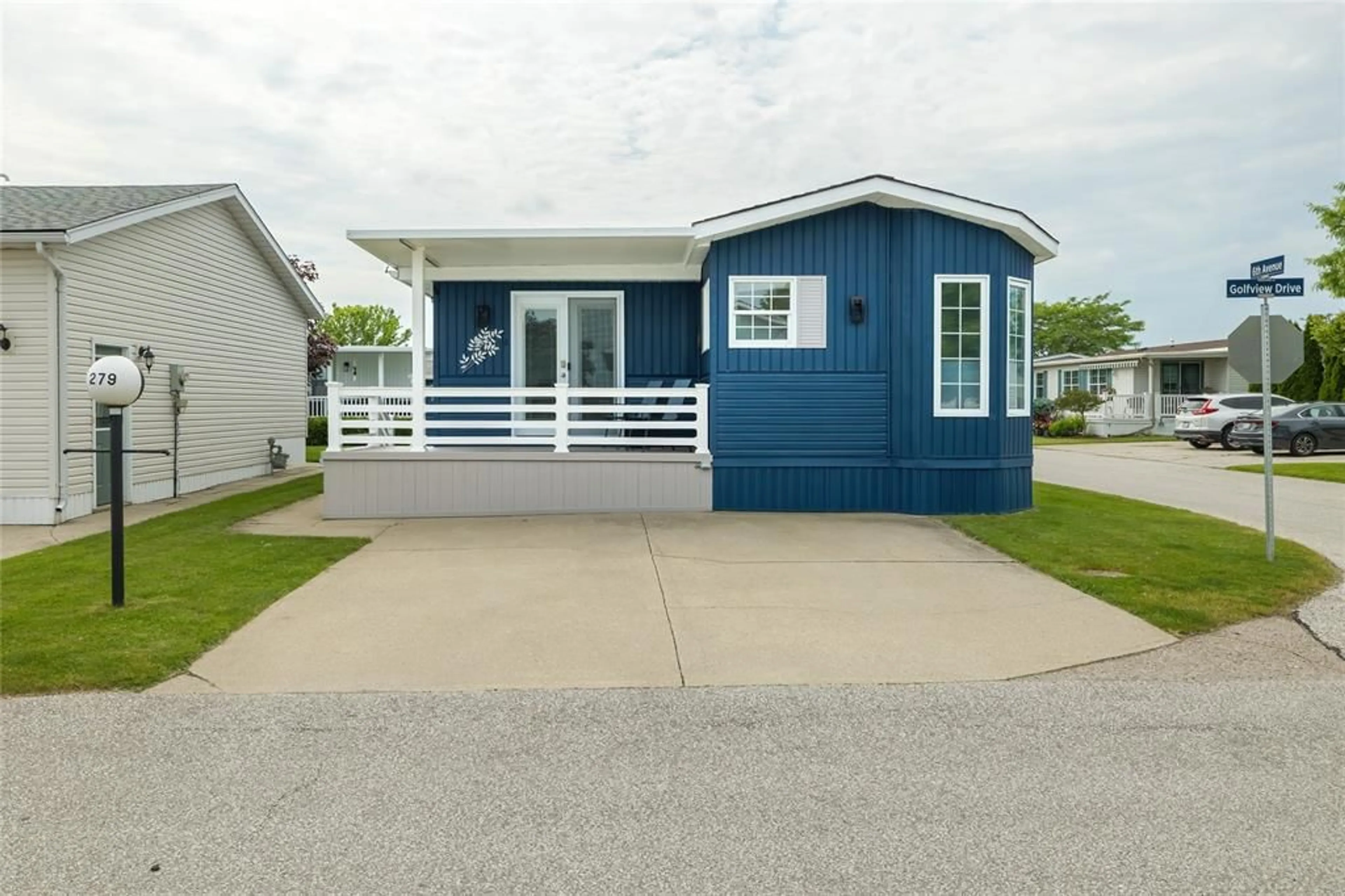 Home with vinyl exterior material, street for 5700 BLACKWELL Sideroad #279, Sarnia Ontario N7W 1B7