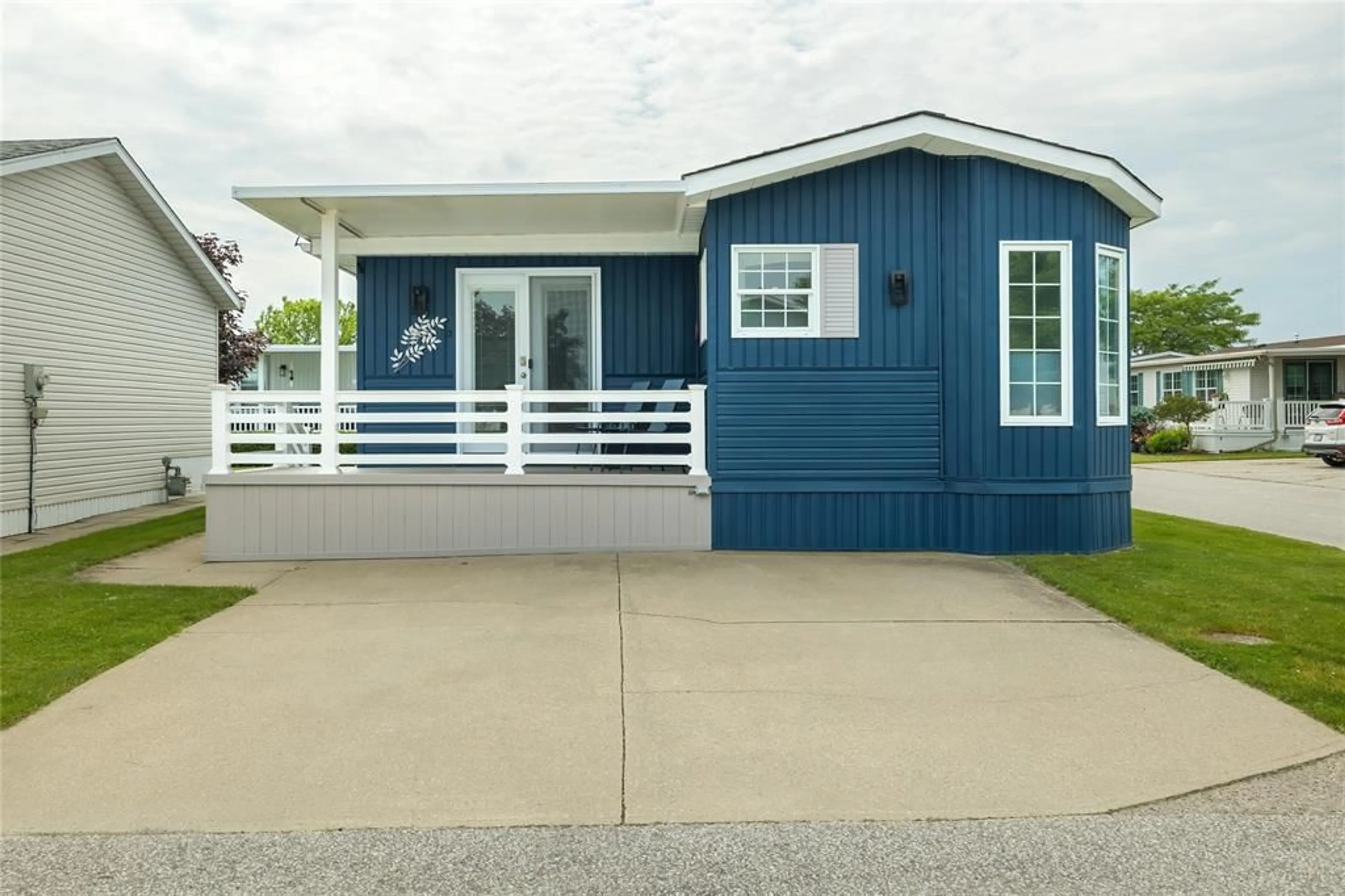 Home with vinyl exterior material, street for 5700 BLACKWELL Sideroad #279, Sarnia Ontario N7W 1B7