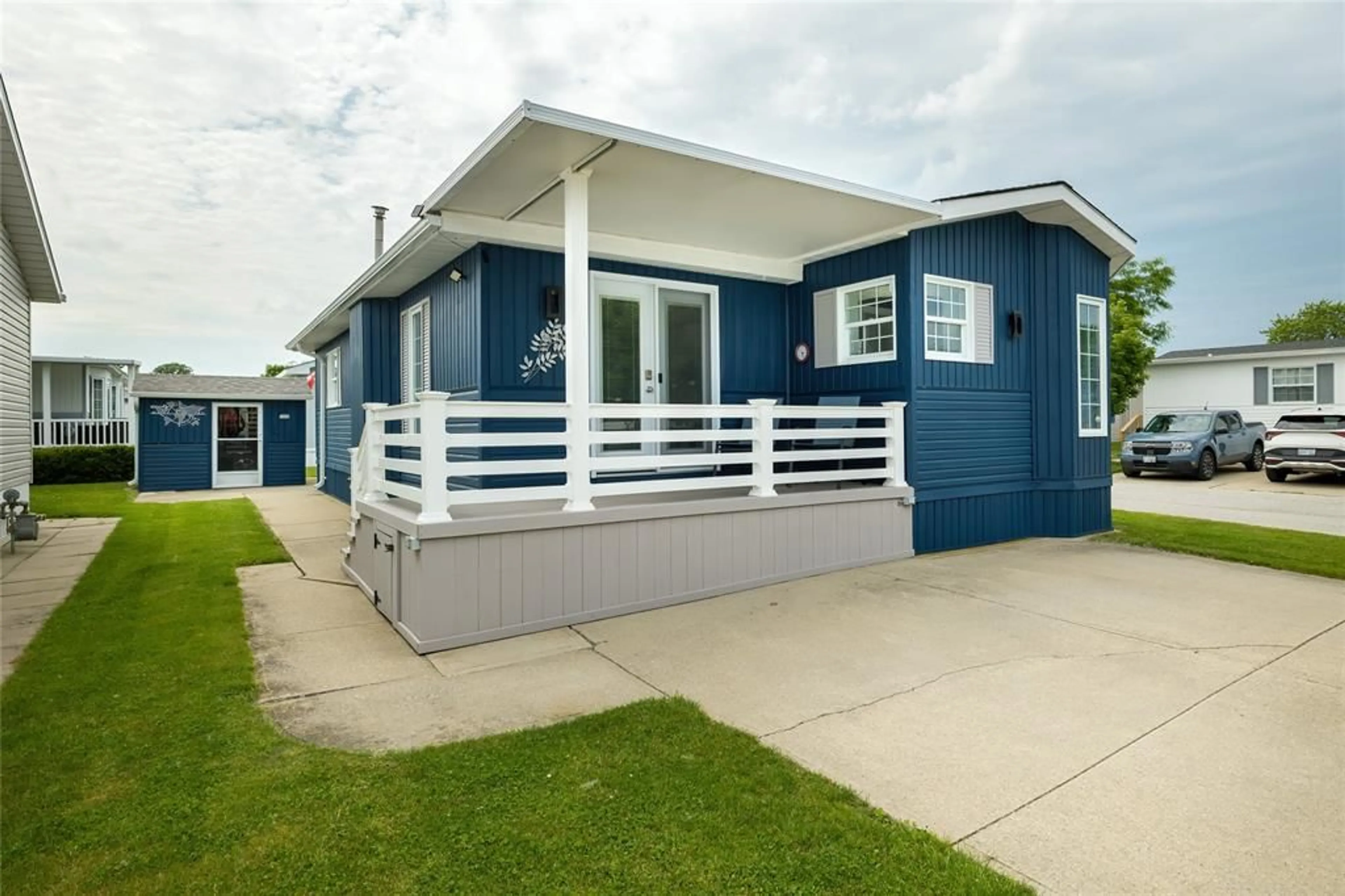 Home with vinyl exterior material, street for 5700 BLACKWELL Sideroad #279, Sarnia Ontario N7W 1B7