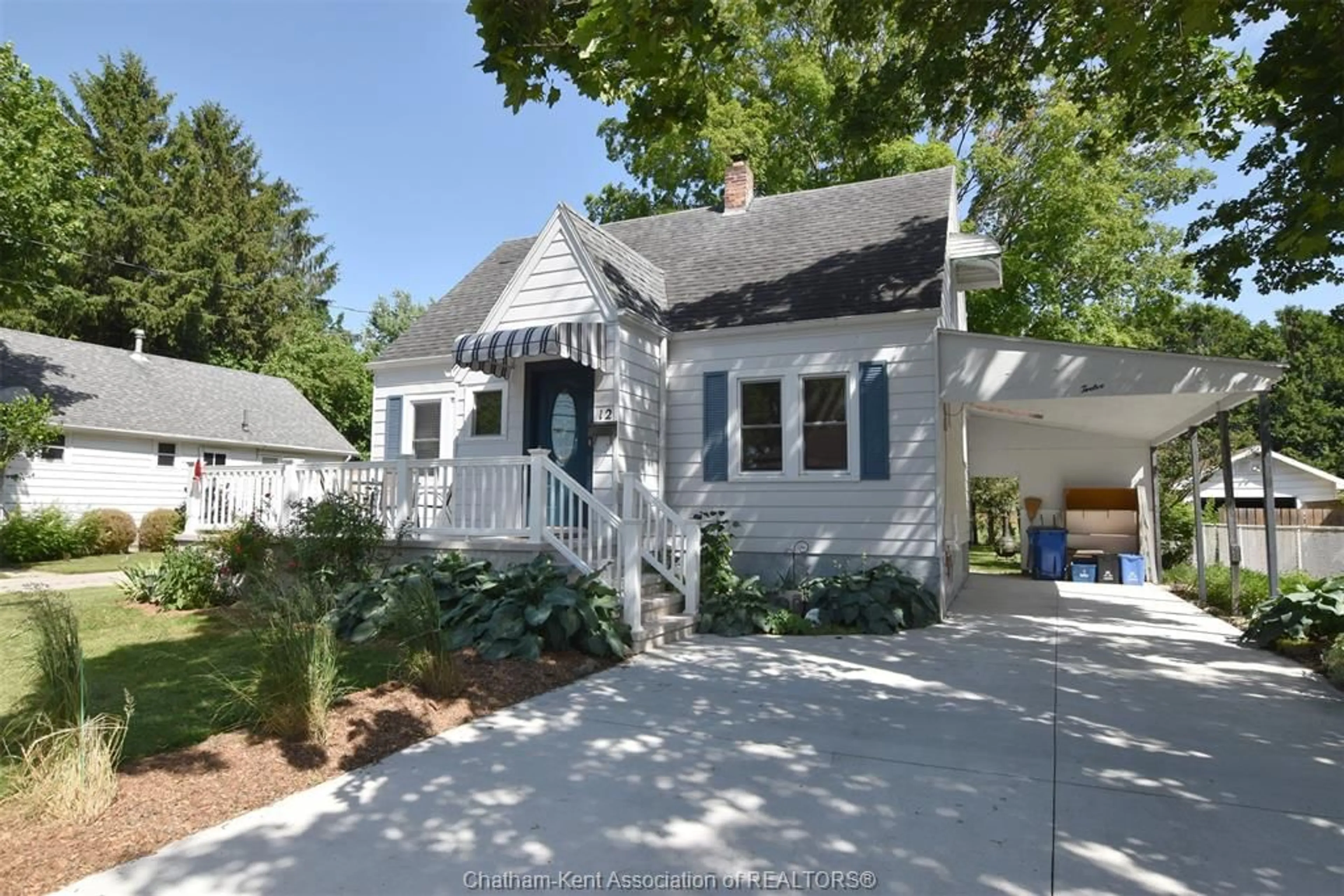 Home with vinyl exterior material, street for 12 Alexandra Ave, Chatham Ontario N7M 1Y1