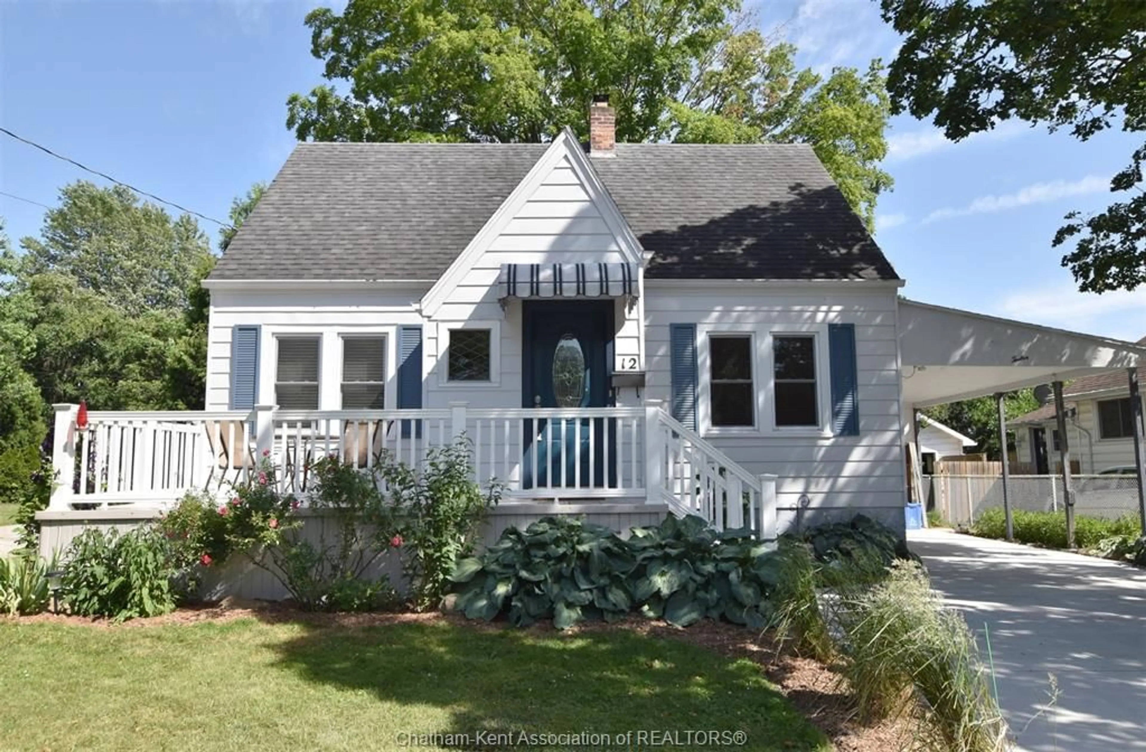 Home with vinyl exterior material, street for 12 Alexandra Ave, Chatham Ontario N7M 1Y1