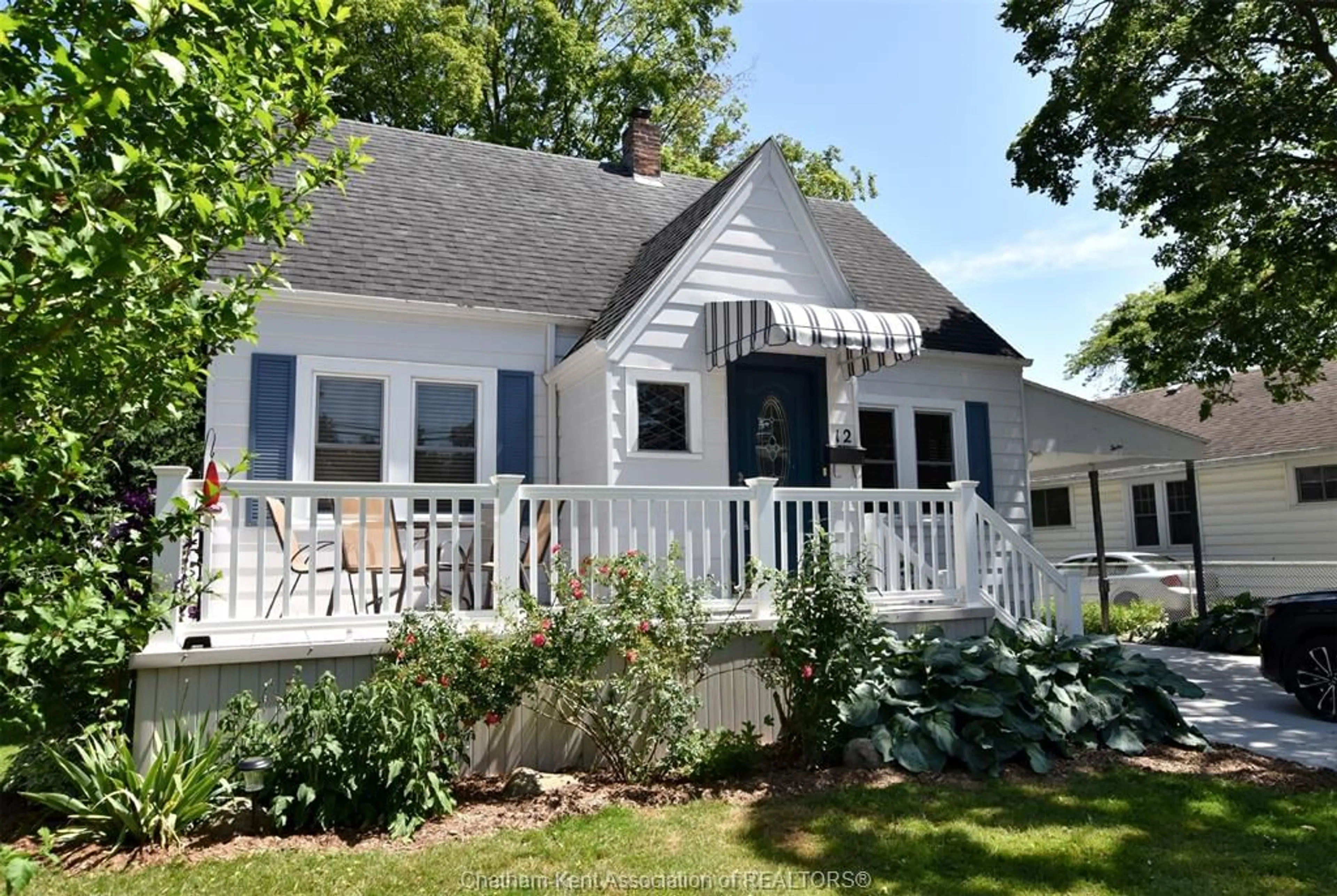 Home with vinyl exterior material, street for 12 Alexandra Ave, Chatham Ontario N7M 1Y1