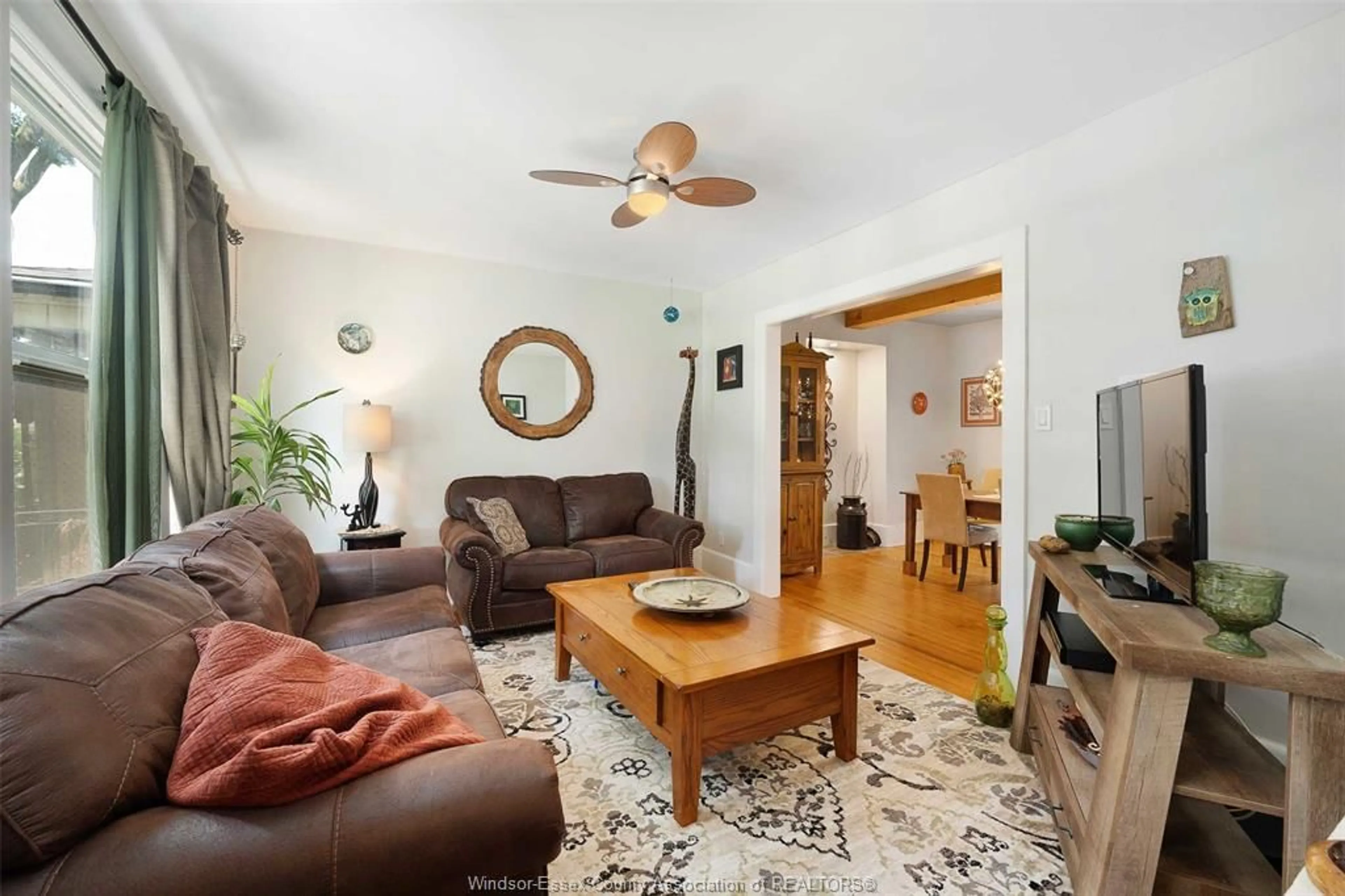Living room with furniture, wood/laminate floor for 1022 WINDSOR Ave, Windsor Ontario N9A 1K4