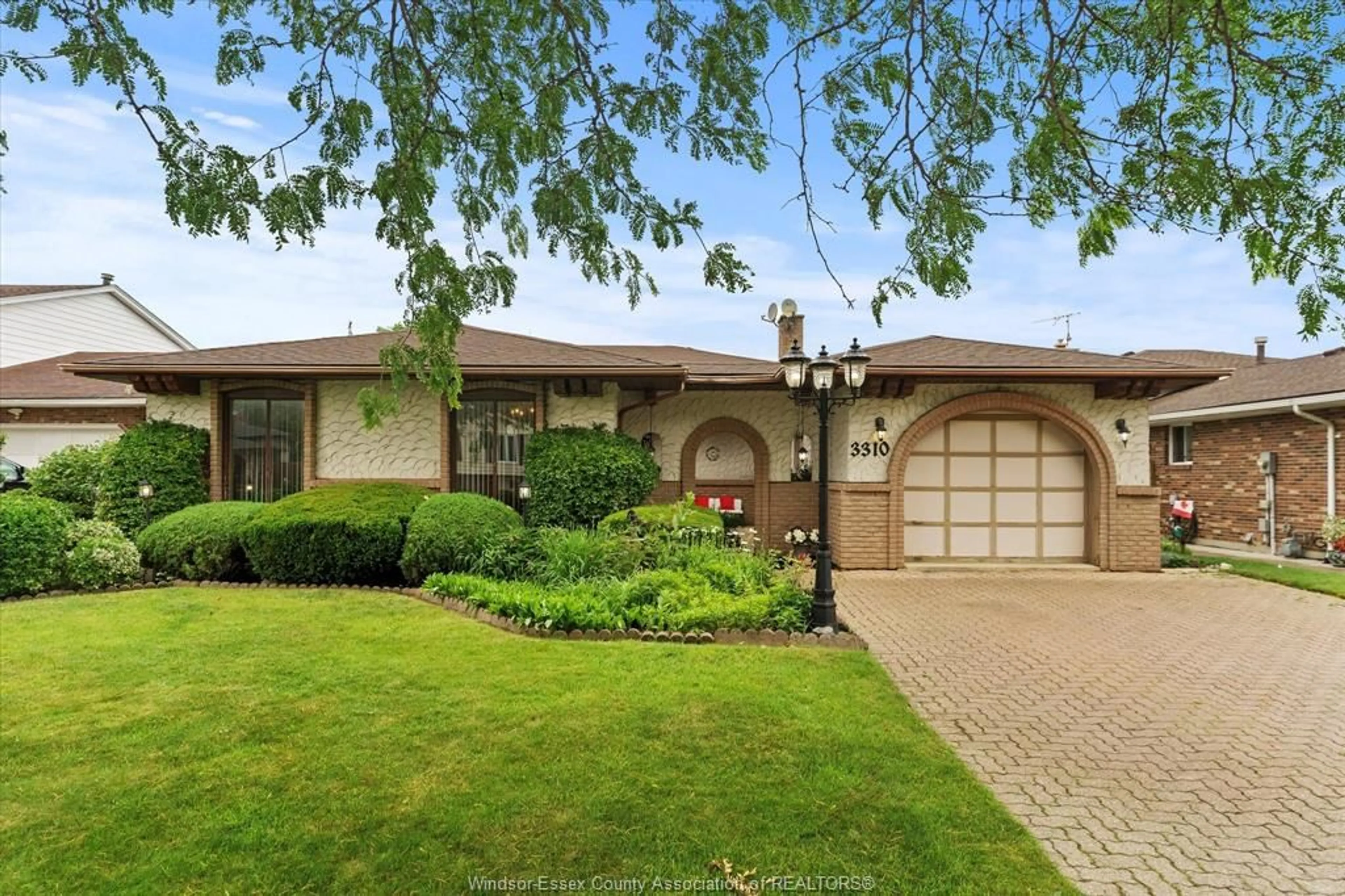 Home with brick exterior material, street for 3310 WILDWOOD DRIVE, Windsor Ontario N8R 1X2
