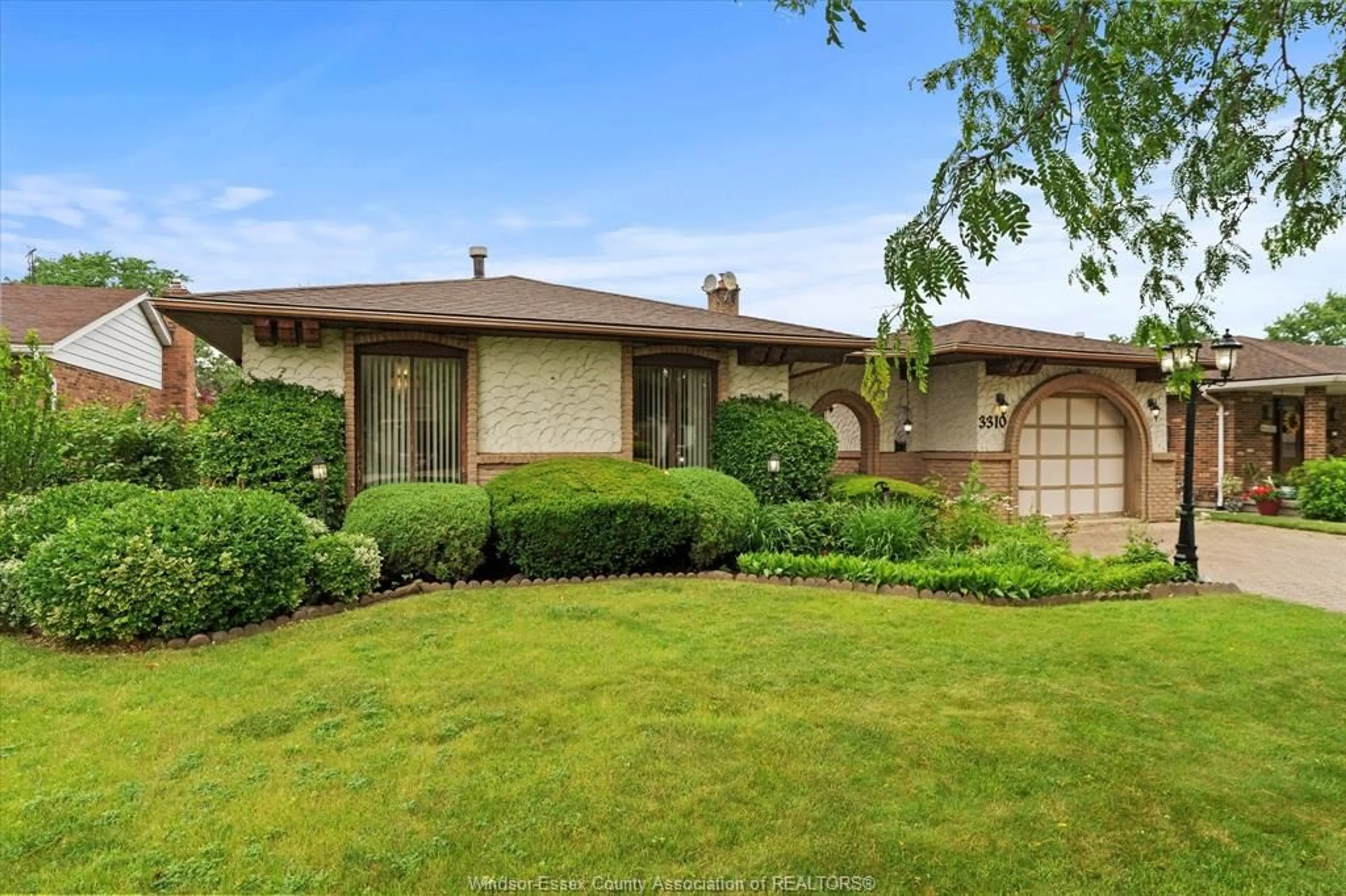 Home with brick exterior material, street for 3310 WILDWOOD DRIVE, Windsor Ontario N8R 1X2