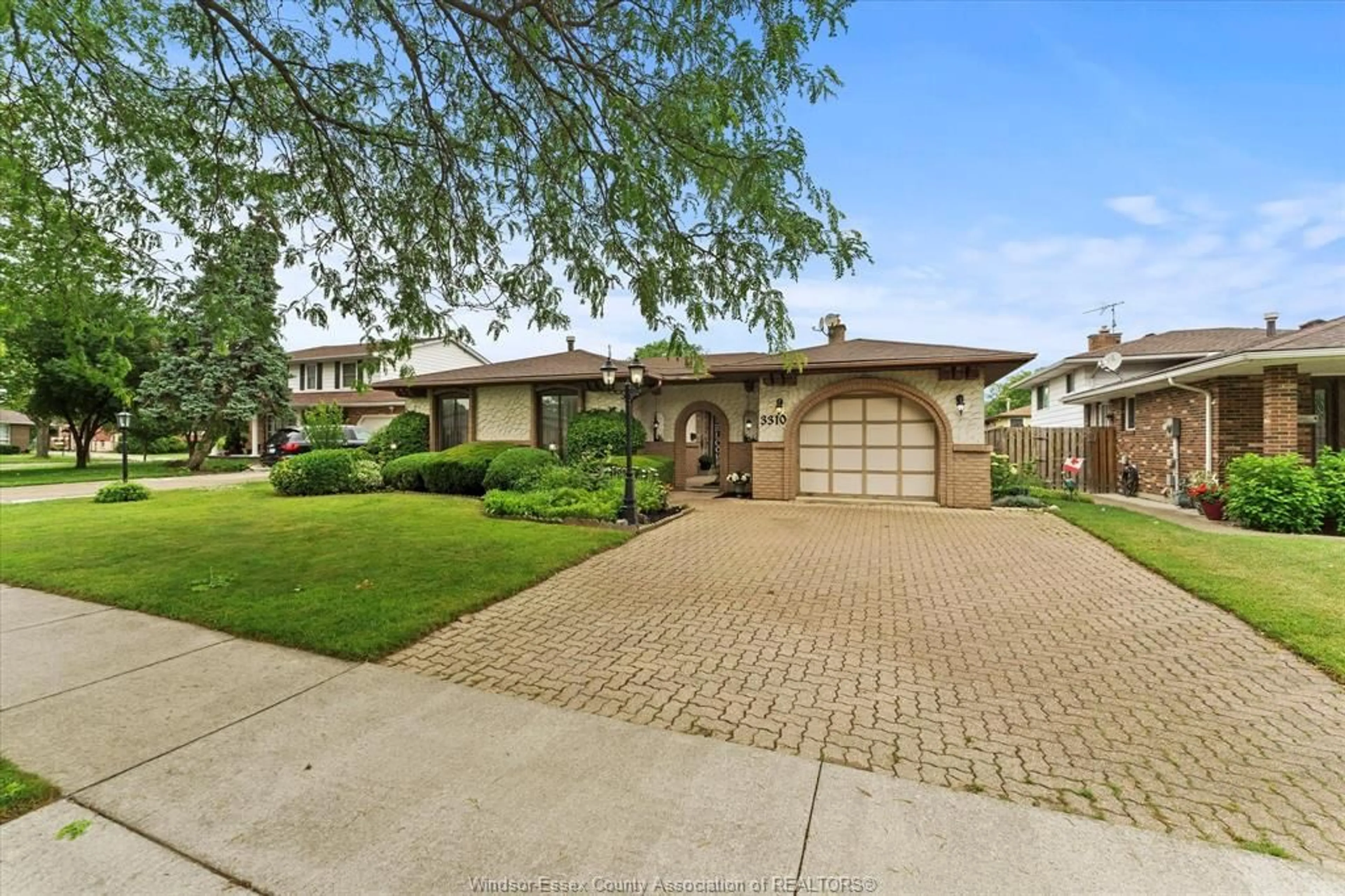 Home with brick exterior material, street for 3310 WILDWOOD DRIVE, Windsor Ontario N8R 1X2