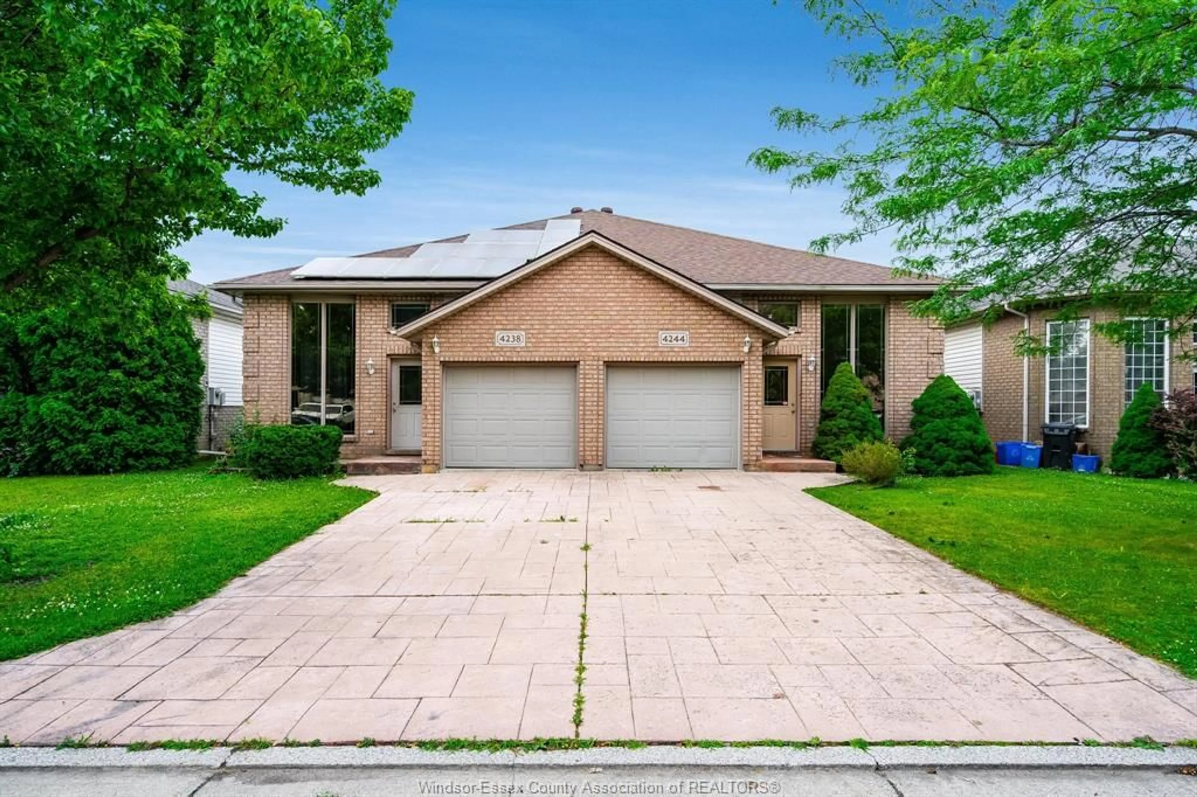 Home with brick exterior material, street for 4244 Showdown Ave, Windsor Ontario N9G 3B1