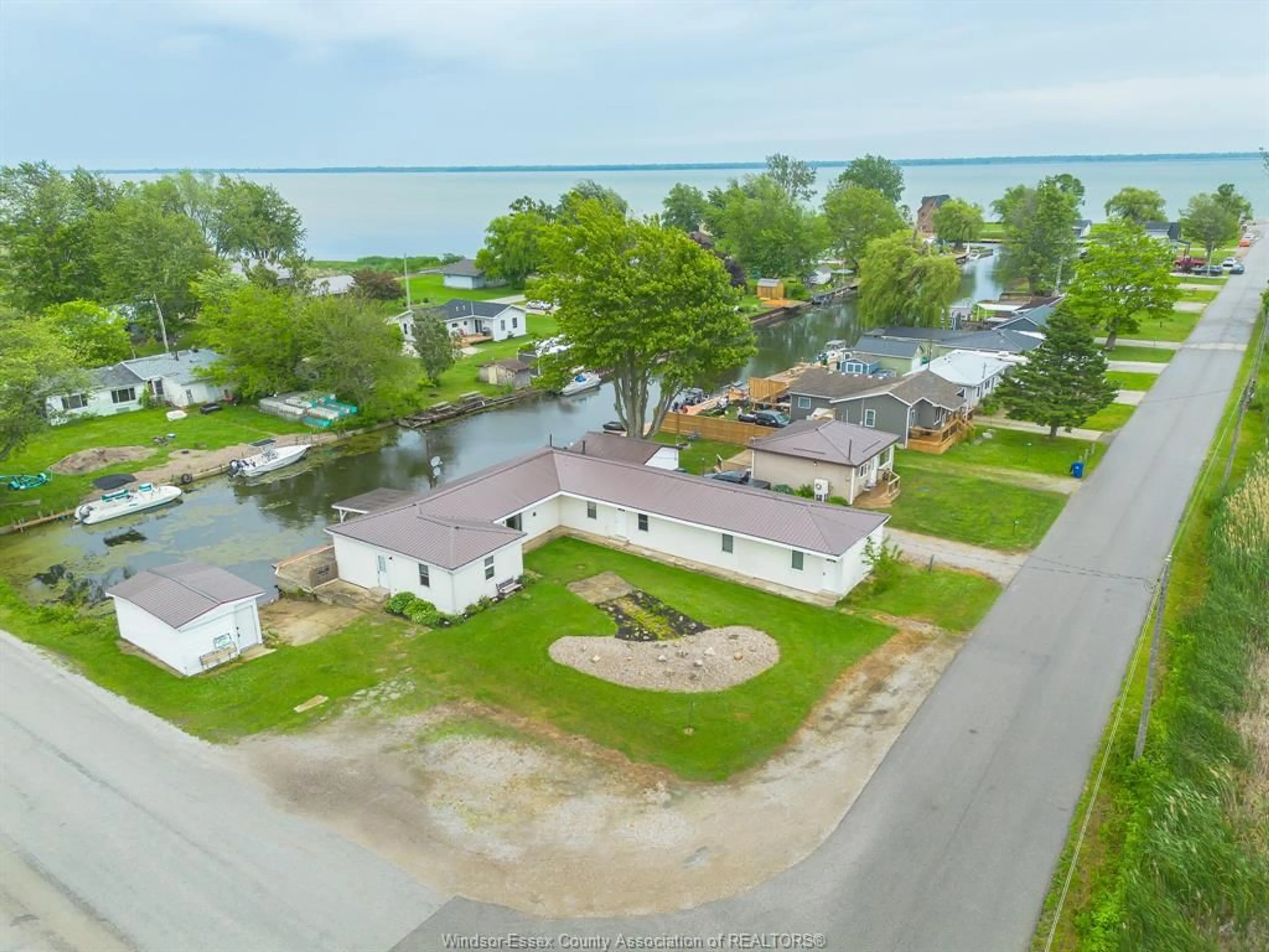 A pic from outside/outdoor area/front of a property/back of a property/a pic from drone, water/lake/river/ocean view for 83 BROCK St, Chatham-Kent Ontario N0P 1A0