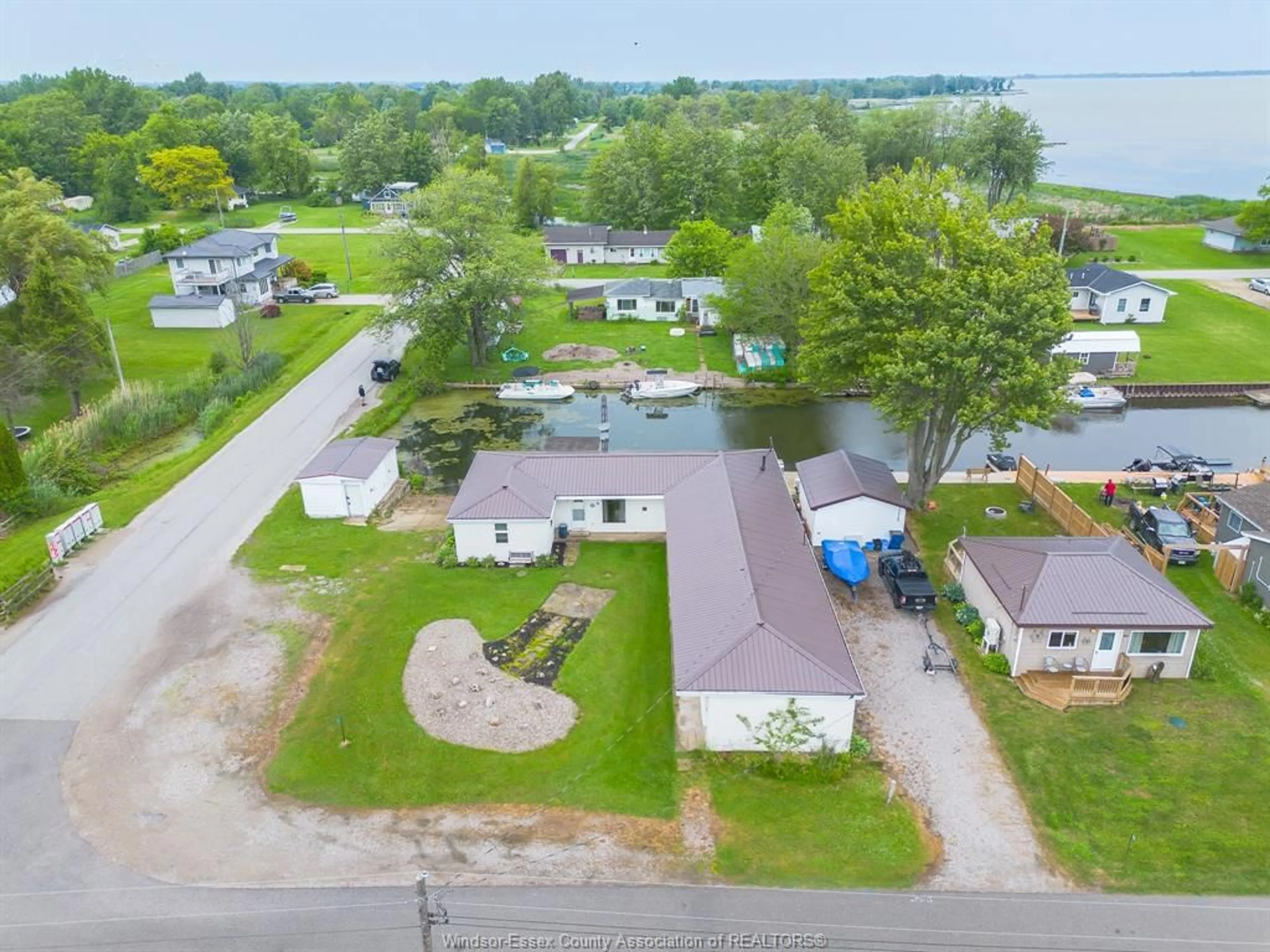 A pic from outside/outdoor area/front of a property/back of a property/a pic from drone, water/lake/river/ocean view for 83 BROCK St, Chatham-Kent Ontario N0P 1A0