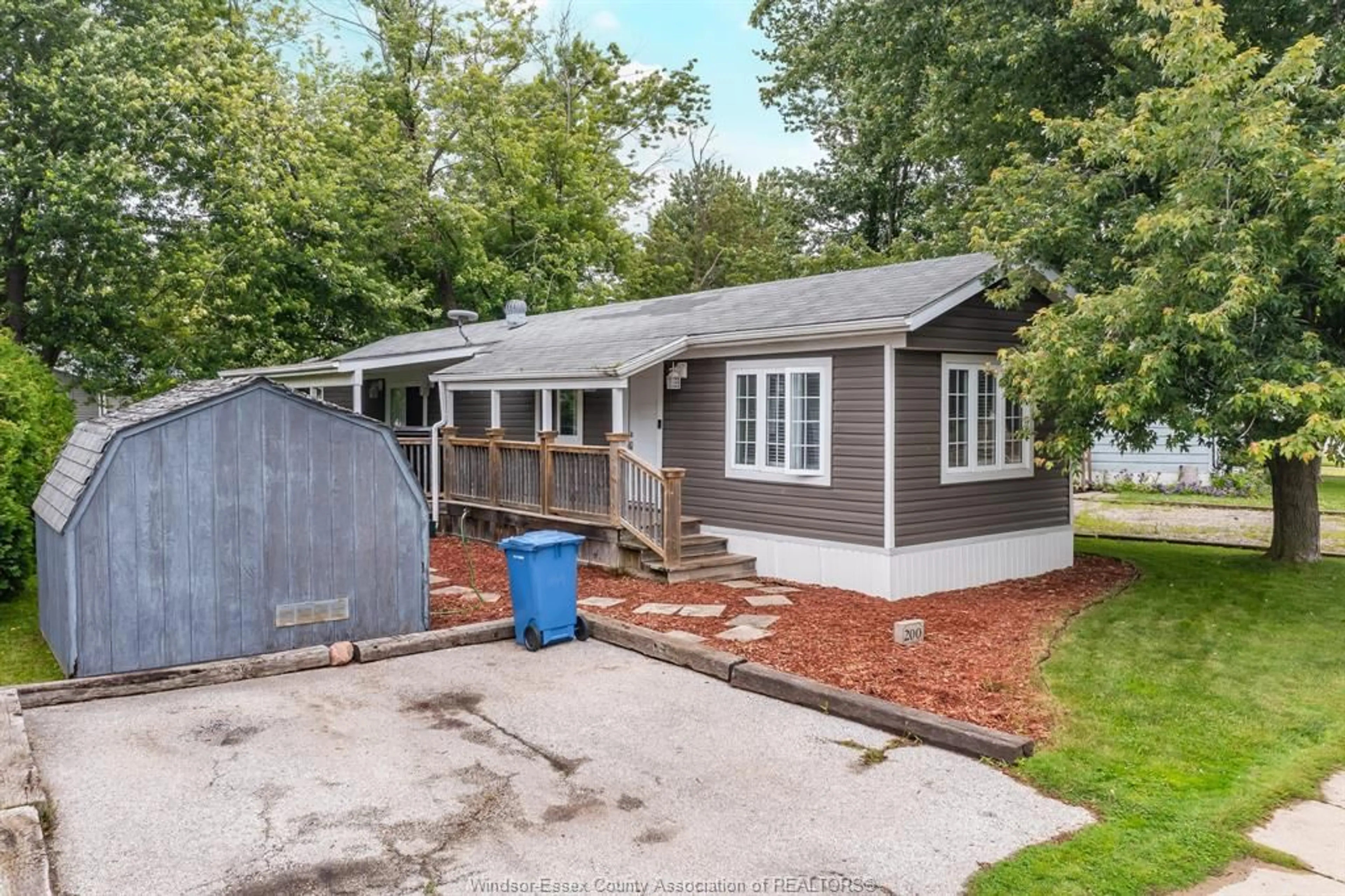 A pic from outside/outdoor area/front of a property/back of a property/a pic from drone, street for 200 STEVEN Crt, Essex Ontario N8M 2A8