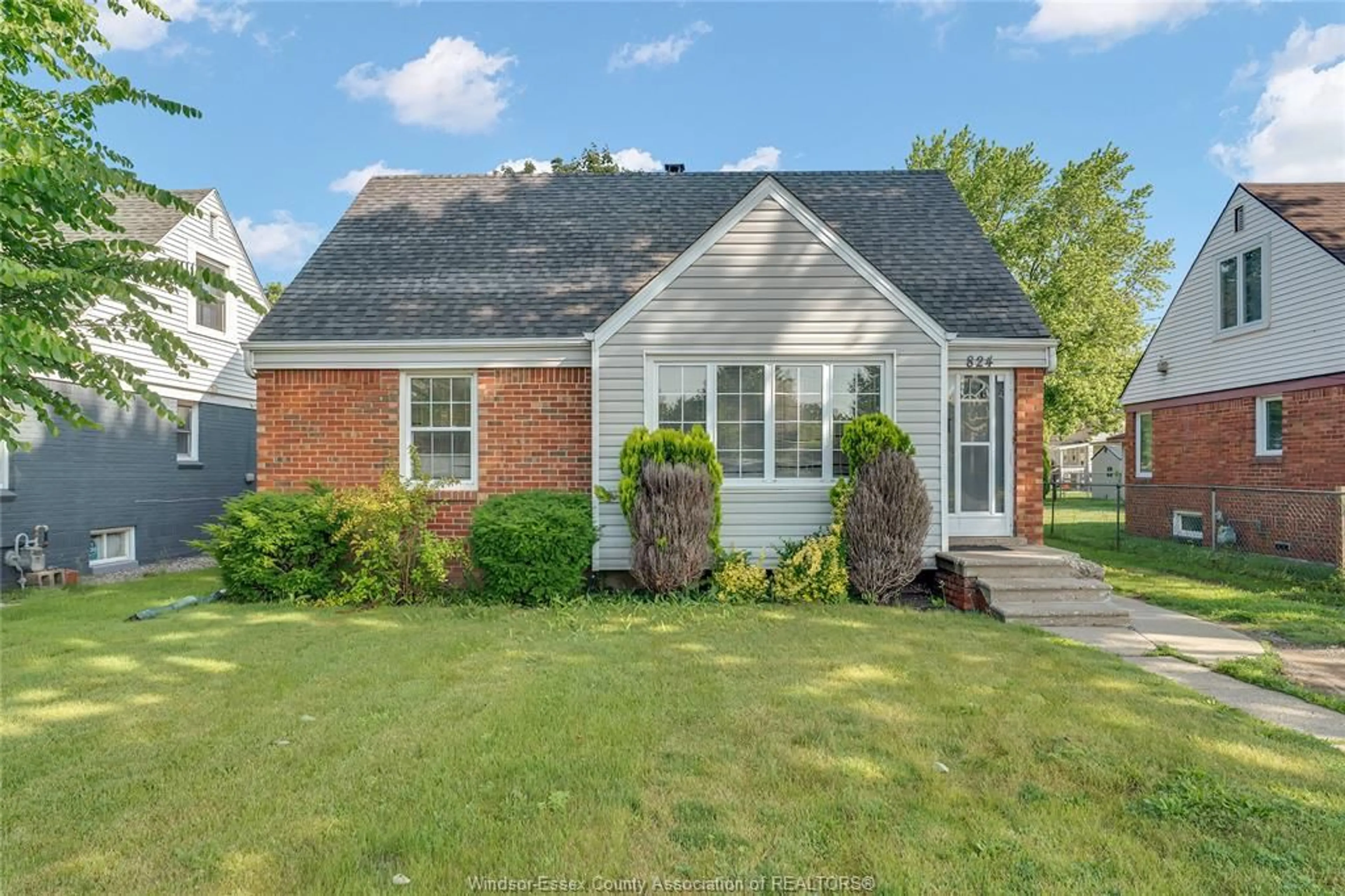 Home with vinyl exterior material, street for 824 YPRES Ave, Windsor Ontario N8W 1P8