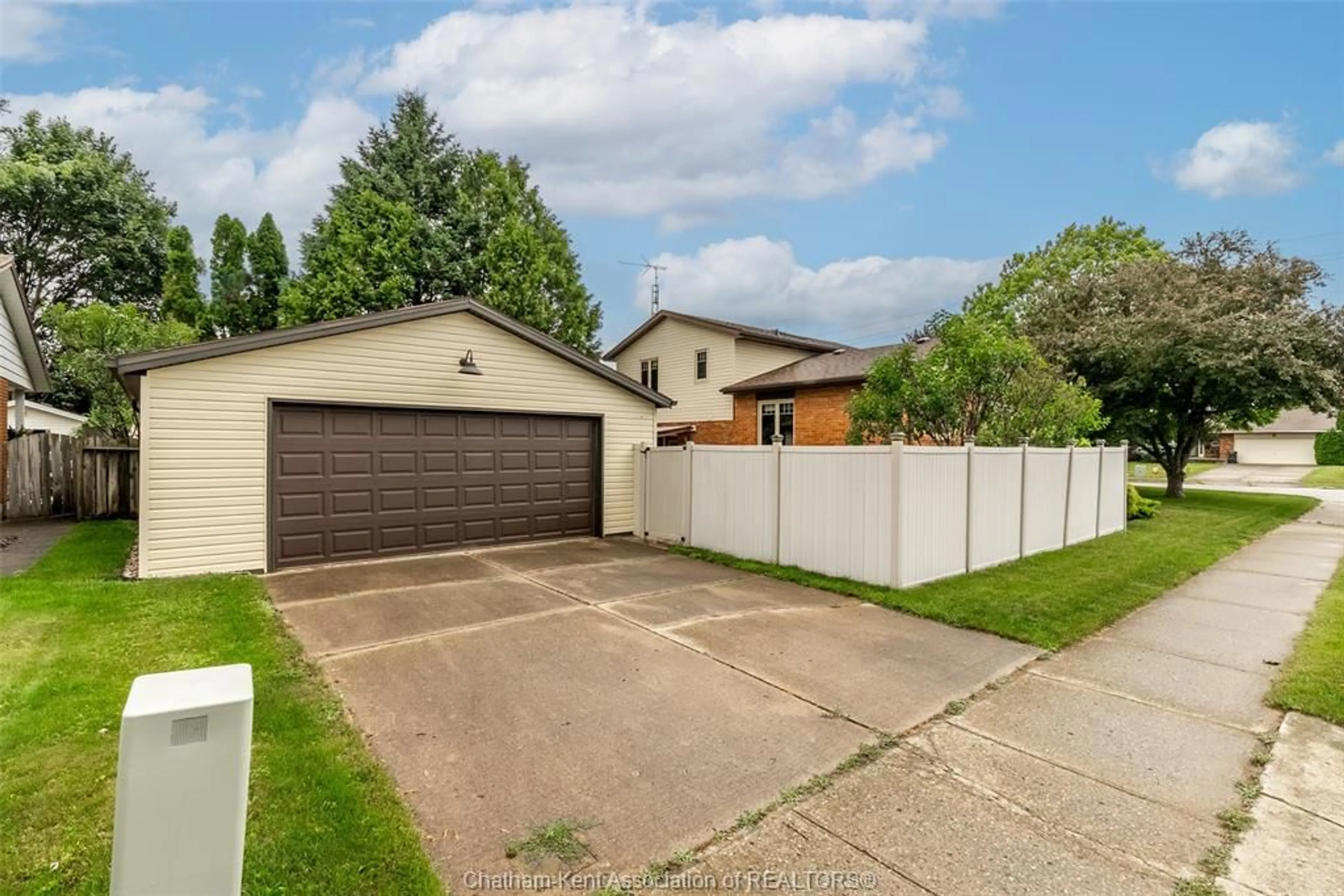 A pic from outside/outdoor area/front of a property/back of a property/a pic from drone, street for 453 Baldoon Rd, Chatham Ontario N7L 5A9