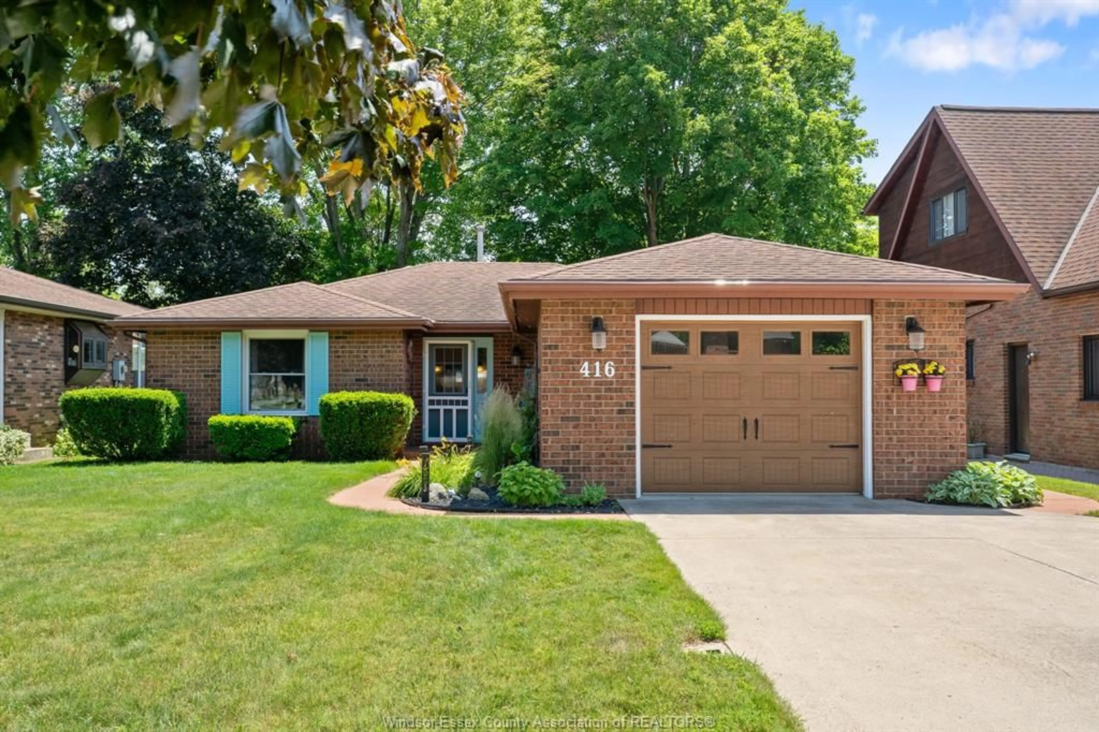 Home with brick exterior material, street for 416 Oak St, Leamington Ontario N8H 3V7