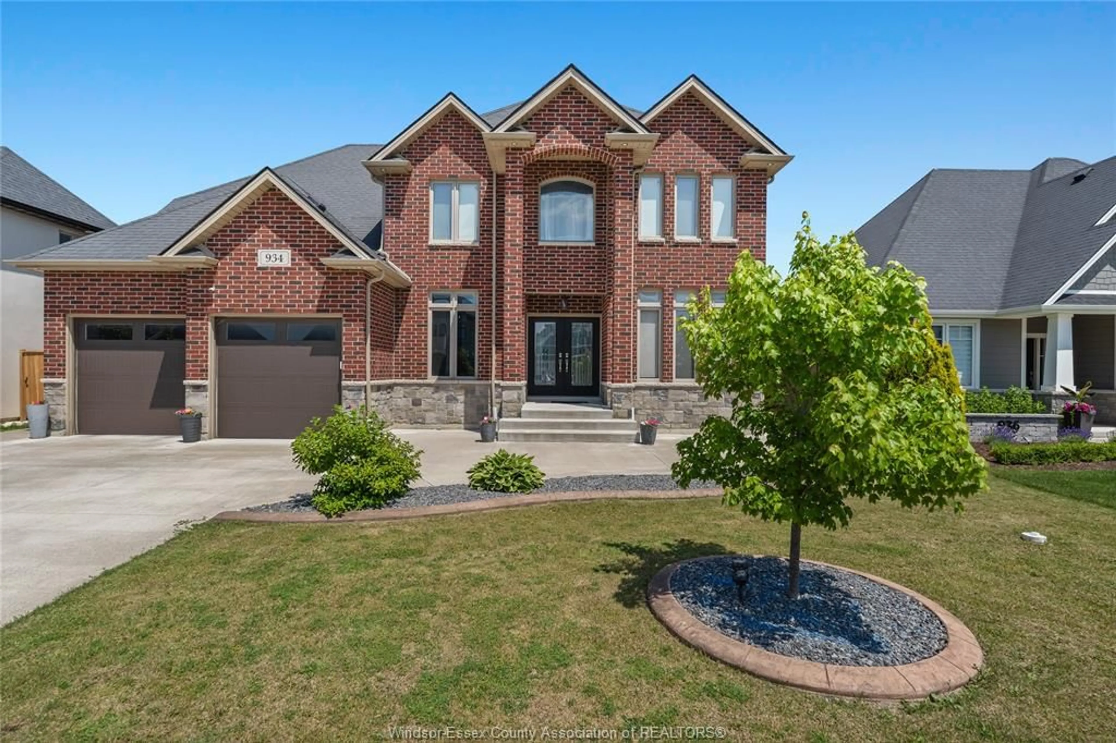 Home with brick exterior material, street for 934 CHATEAU Ave, Windsor Ontario N8P 0E6