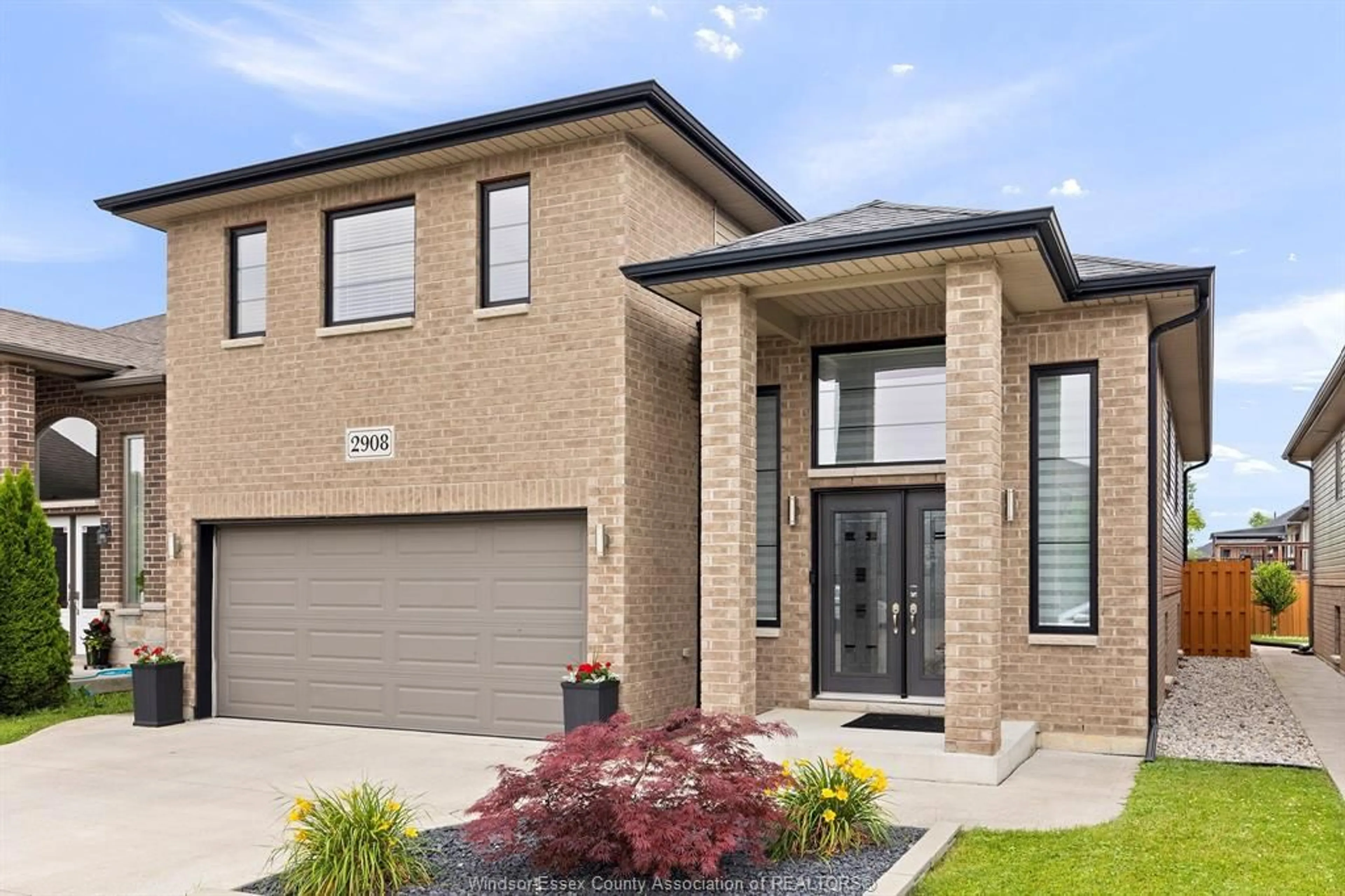 Home with brick exterior material, street for 2908 MCROBBIE Cres, Windsor Ontario N8R 0A7