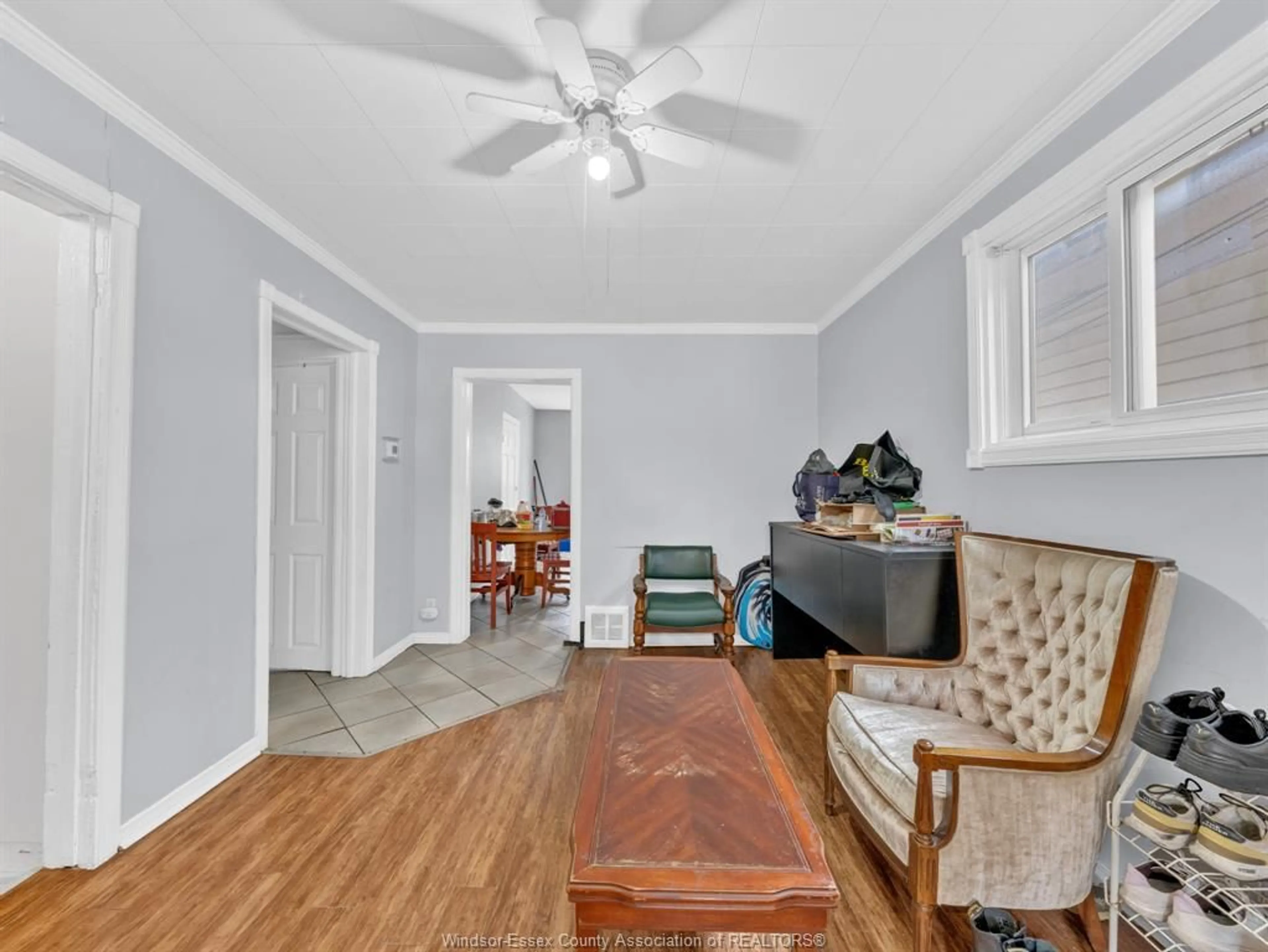 Living room with furniture, wood/laminate floor for 417 BRIDGE, Windsor Ontario N9B 2M3