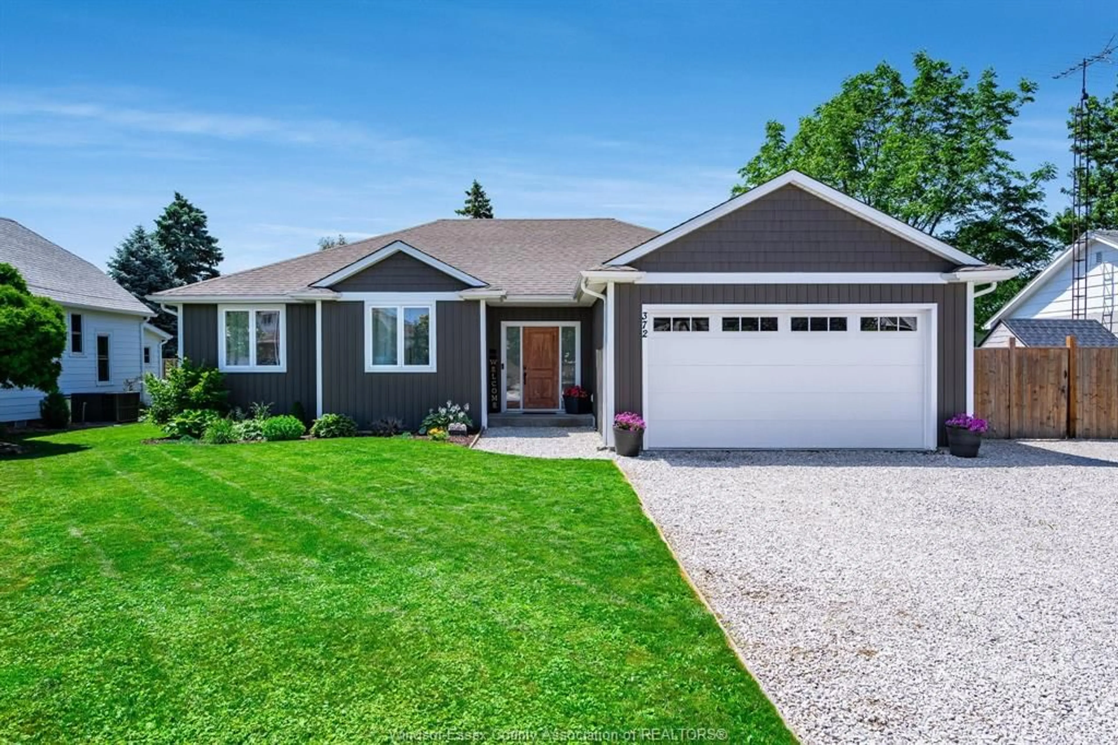 Home with vinyl exterior material, street for 372 St. Charles Street, Belle River Ontario N0R 1A0