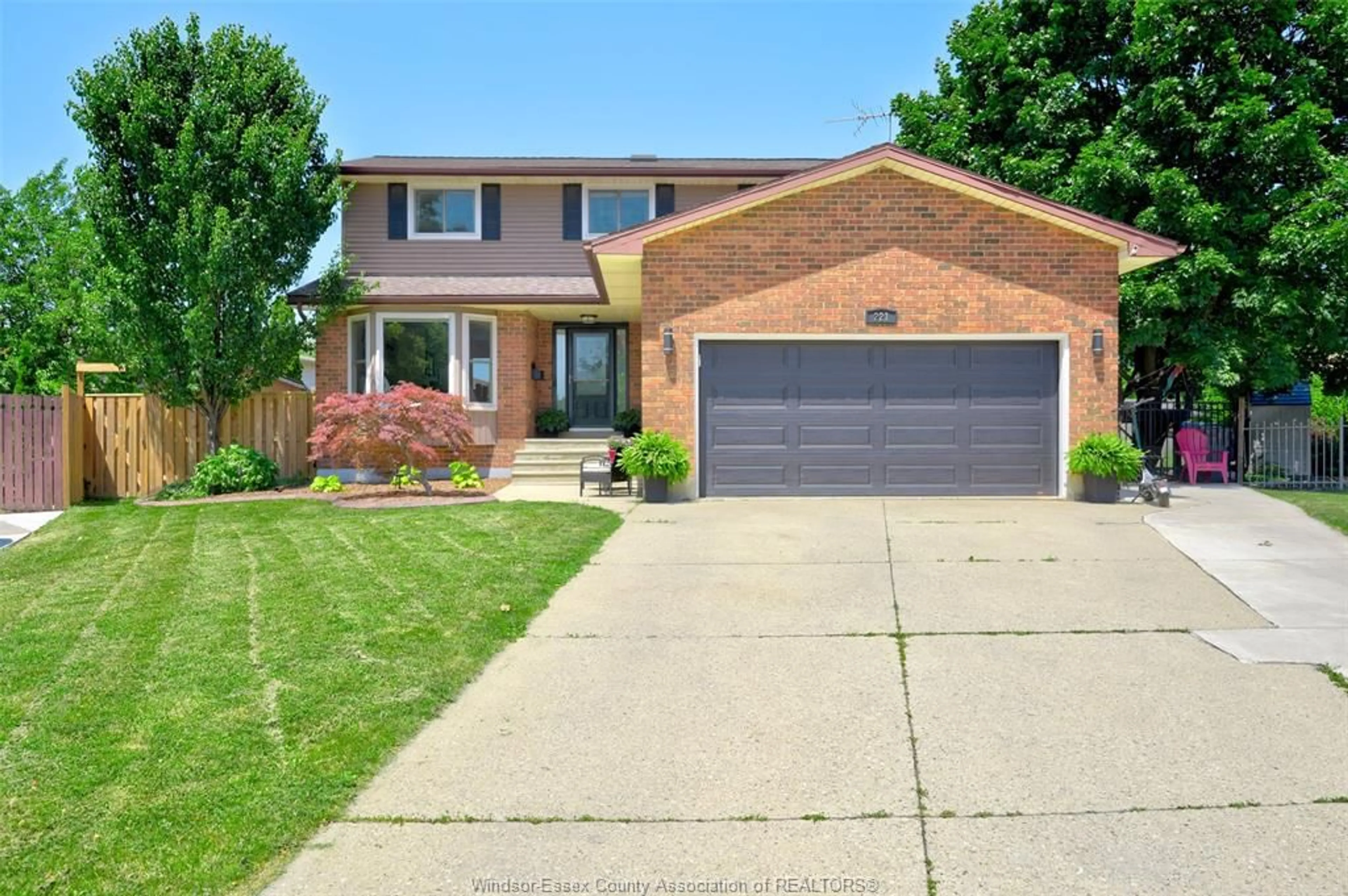 Home with brick exterior material, street for 221 DONALDA Crt, Tecumseh Ontario N8N 3K2