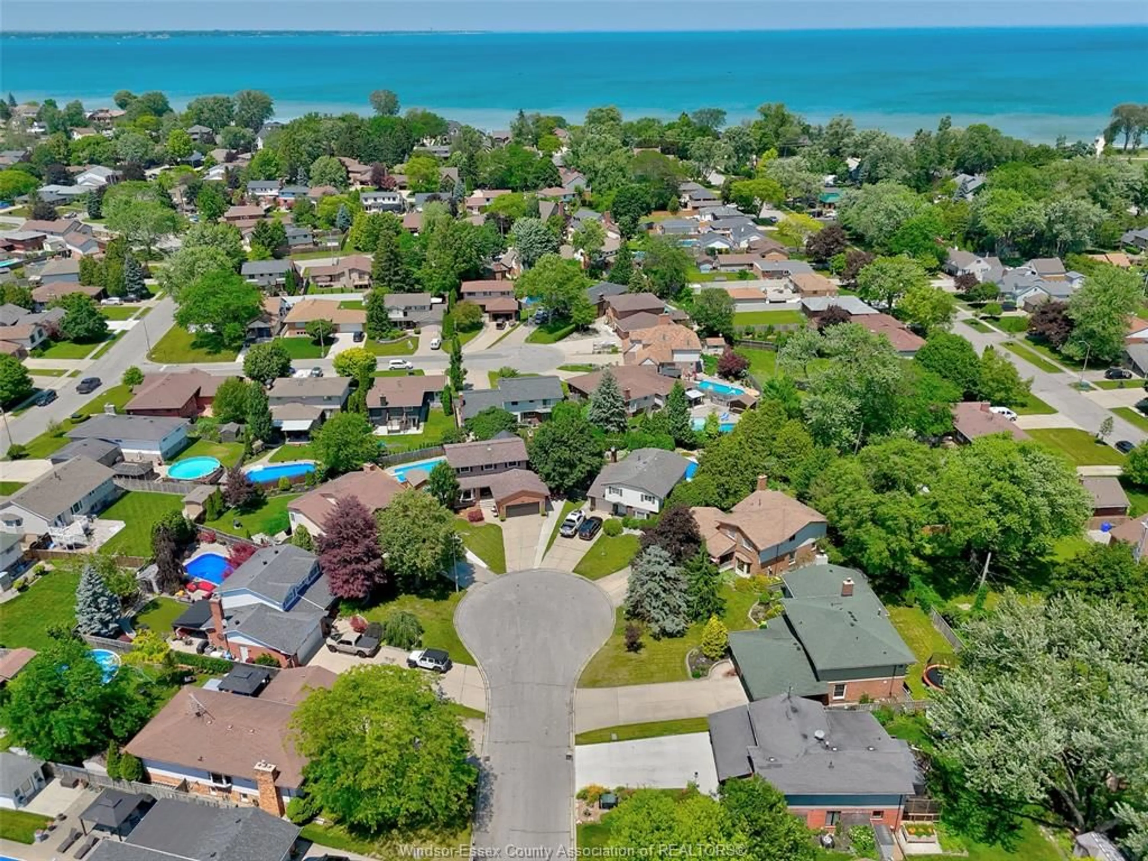A pic from outside/outdoor area/front of a property/back of a property/a pic from drone, water/lake/river/ocean view for 221 DONALDA Crt, Tecumseh Ontario N8N 3K2