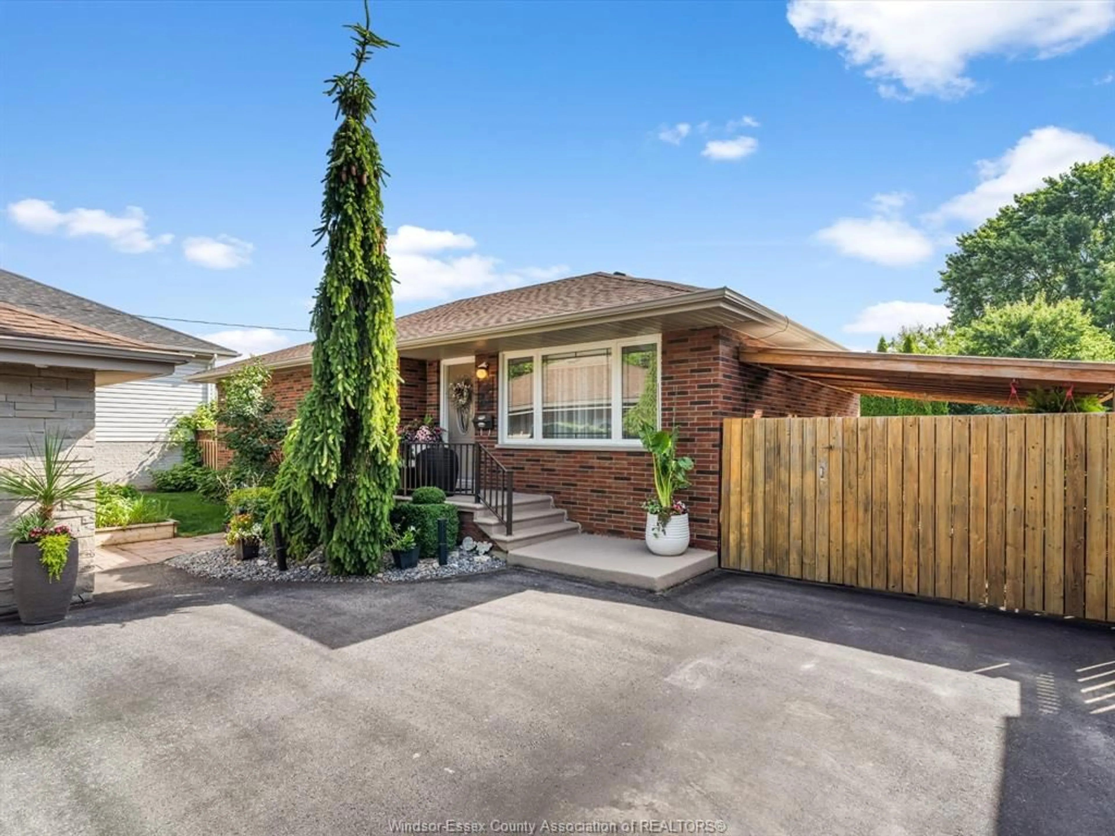 Home with brick exterior material, street for 2950 LAUZON, Windsor Ontario N8T 2Z8