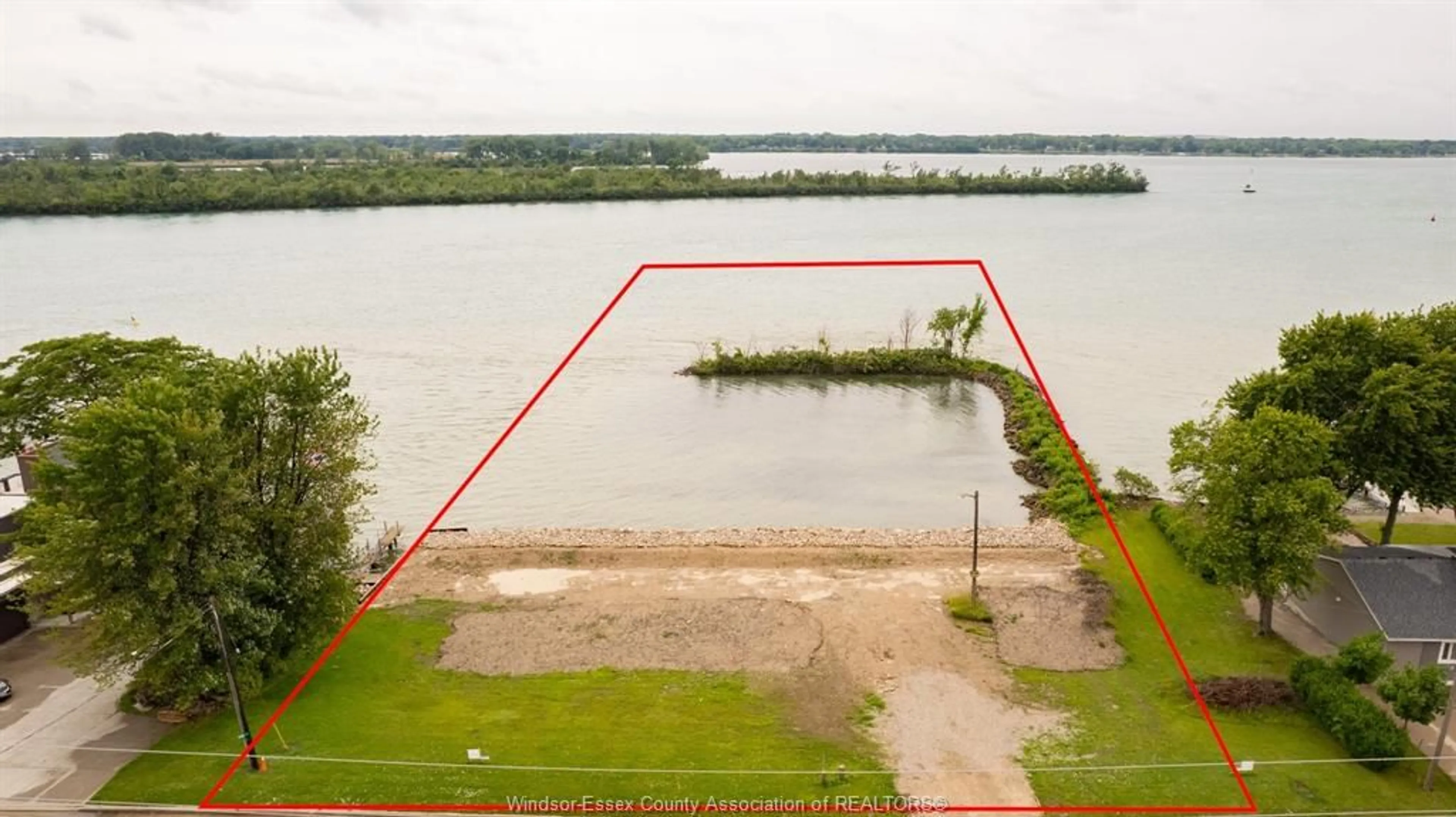 A pic from outside/outdoor area/front of a property/back of a property/a pic from drone, water/lake/river/ocean view for 639 FRONT Rd #LOT 2, Amherstburg Ontario N9V 2V6