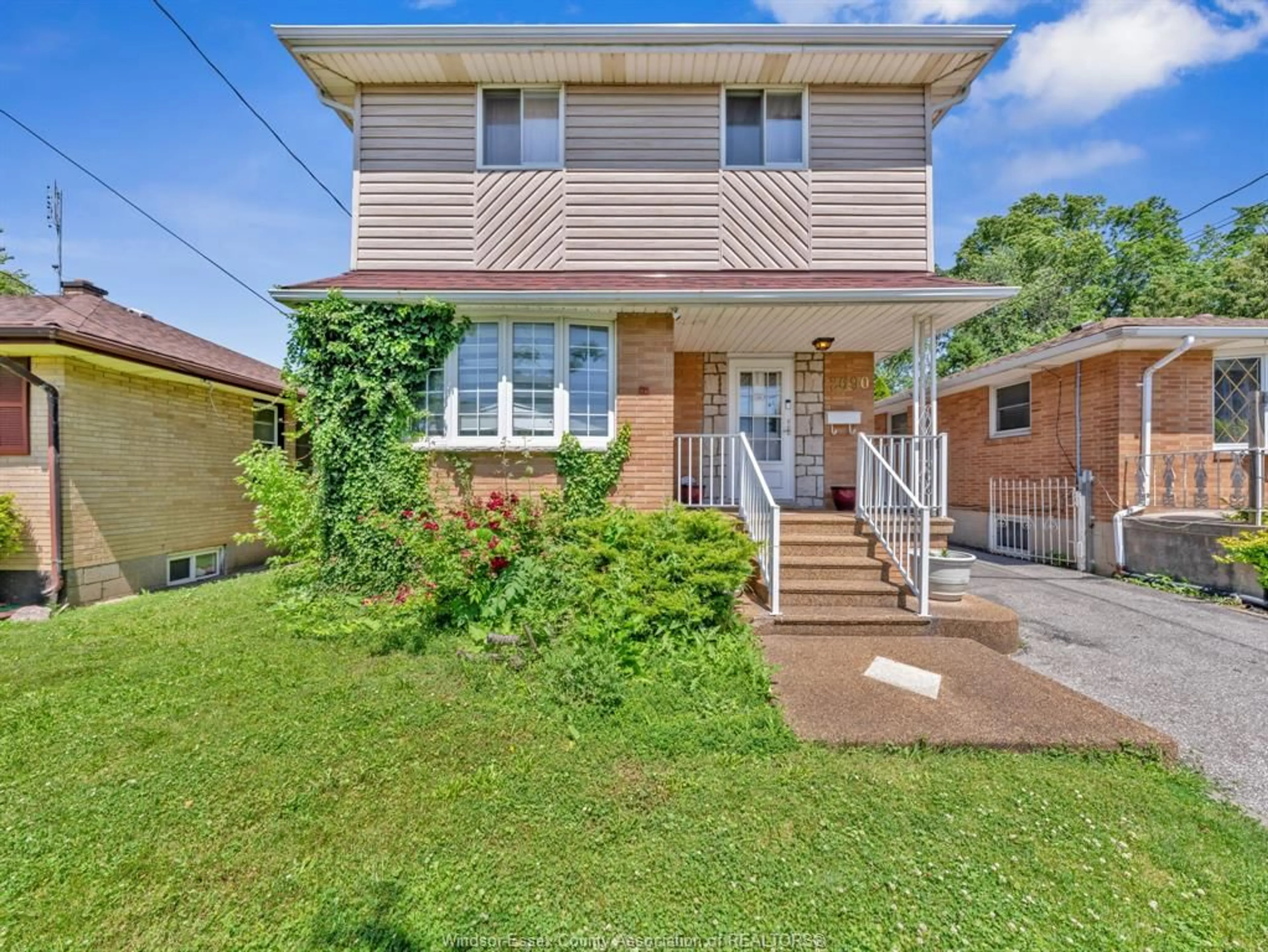 Home with brick exterior material, street for 2690 TOURANGEAU Rd, Windsor Ontario N8W 4P3