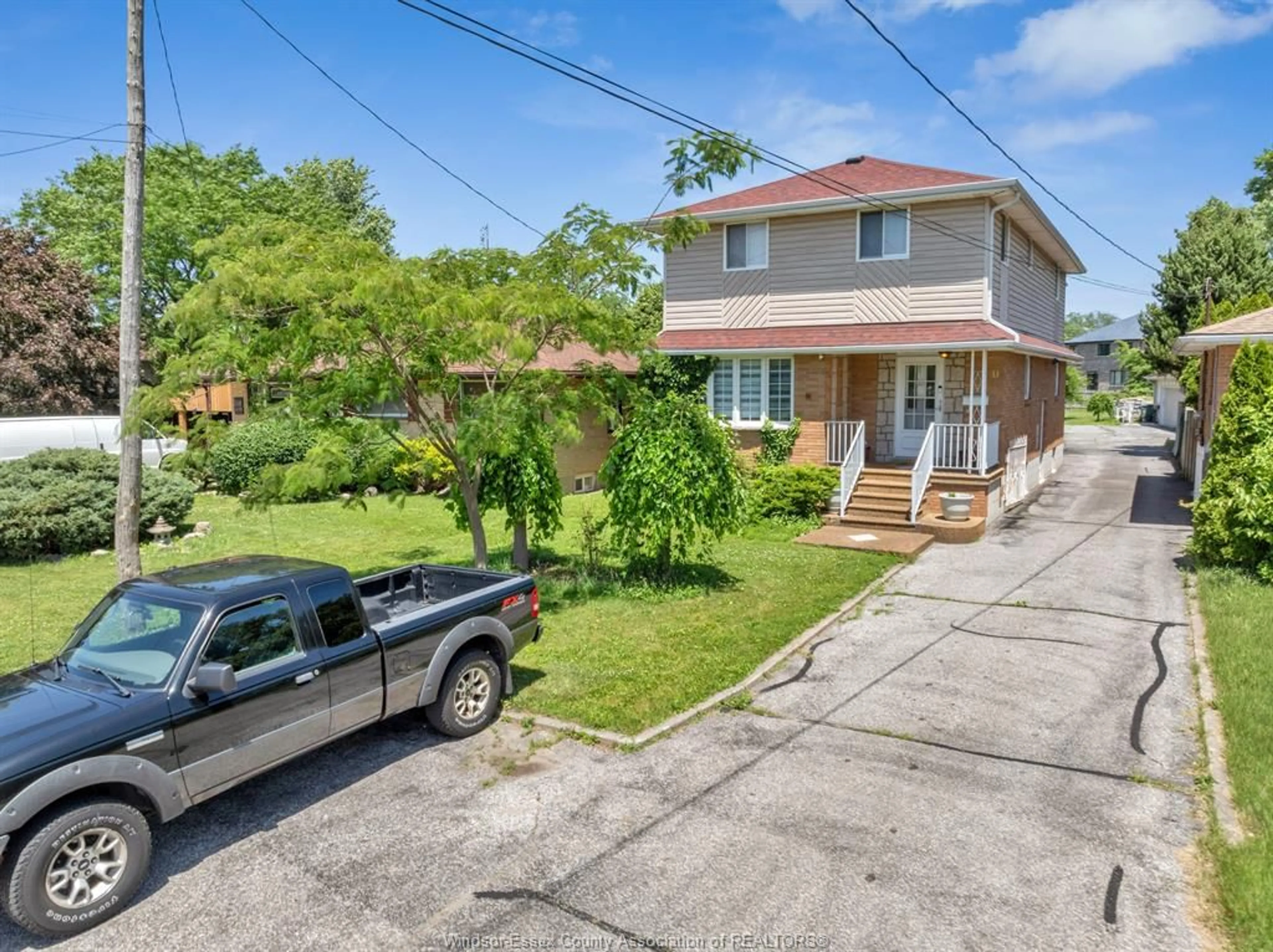 A pic from outside/outdoor area/front of a property/back of a property/a pic from drone, street for 2690 TOURANGEAU Rd, Windsor Ontario N8W 4P3
