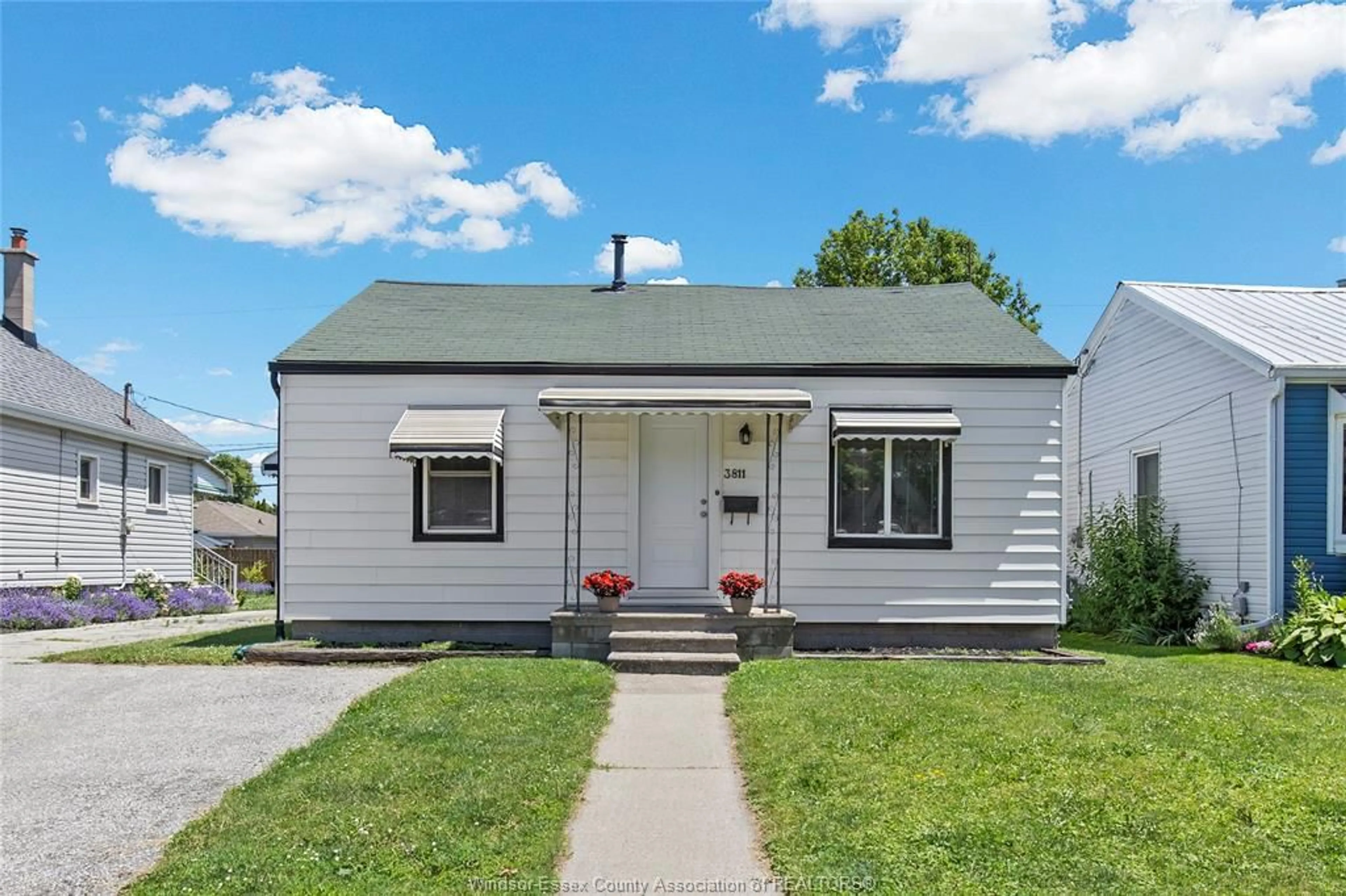 Home with vinyl exterior material, street for 3811 CONNAUGHT, Windsor Ontario N9C 2C2