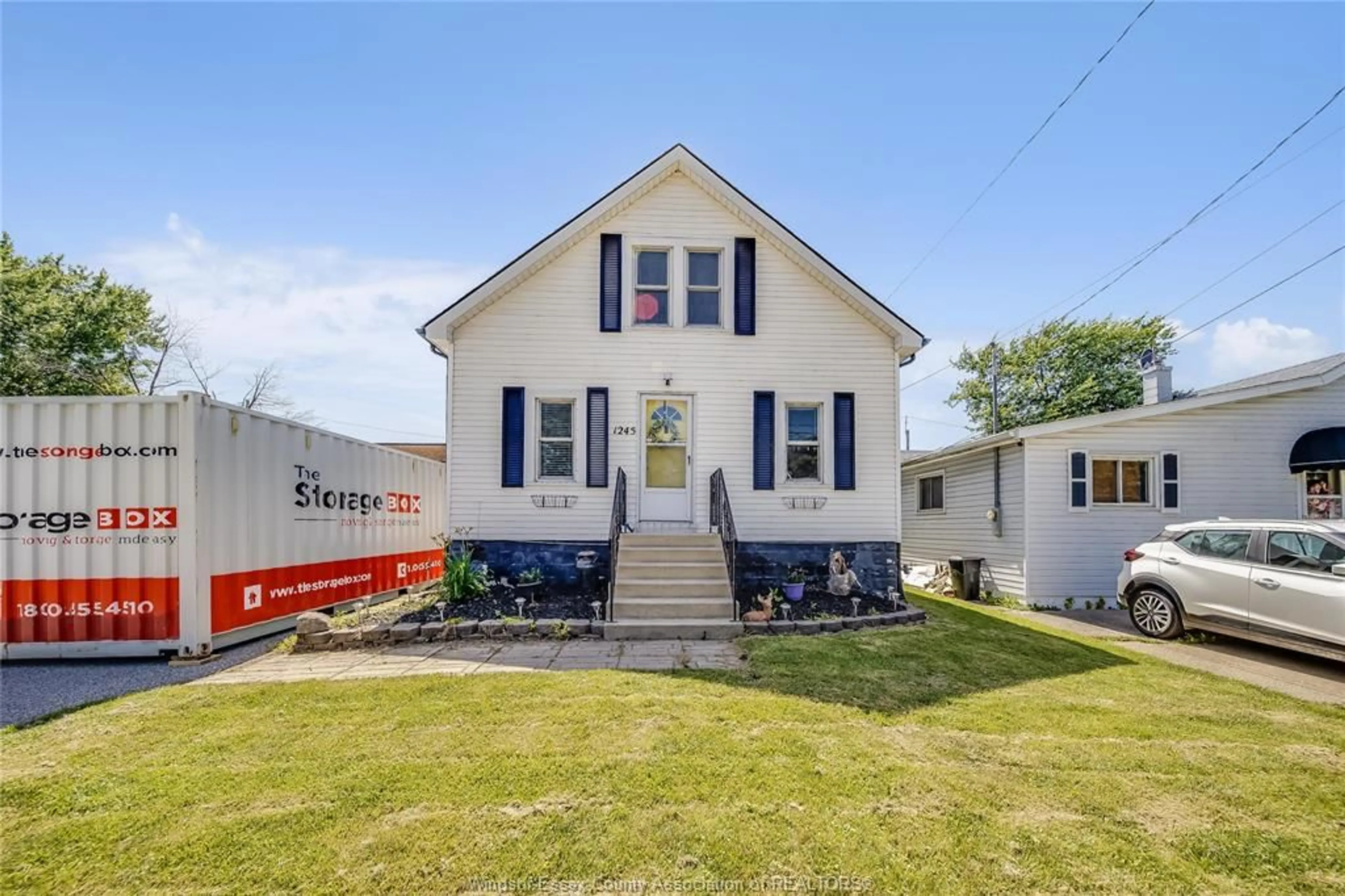 Home with vinyl exterior material, street for 1245 POISSON, Tecumseh Ontario N8N 1T2