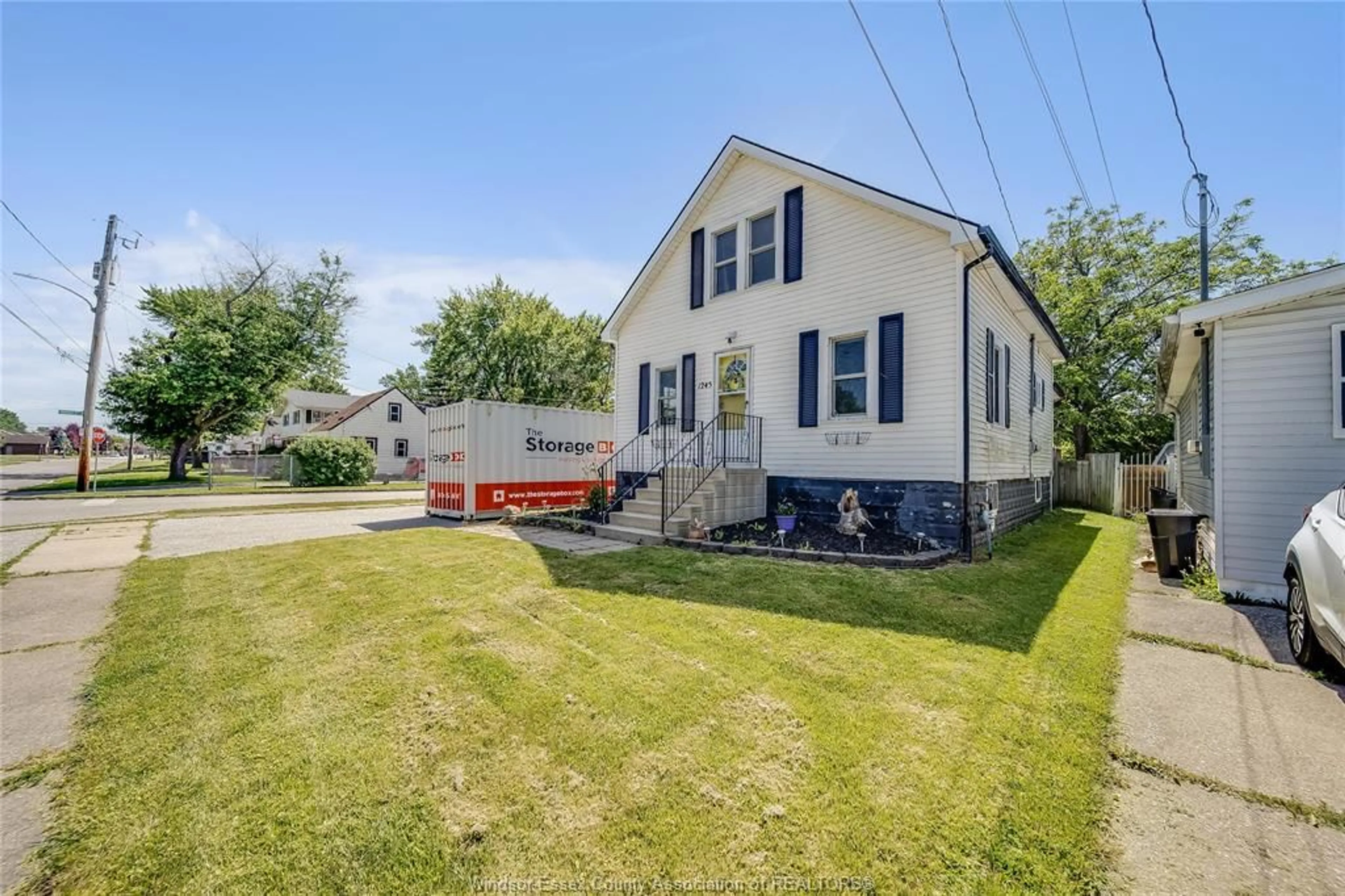 A pic from outside/outdoor area/front of a property/back of a property/a pic from drone, street for 1245 POISSON, Tecumseh Ontario N8N 1T2
