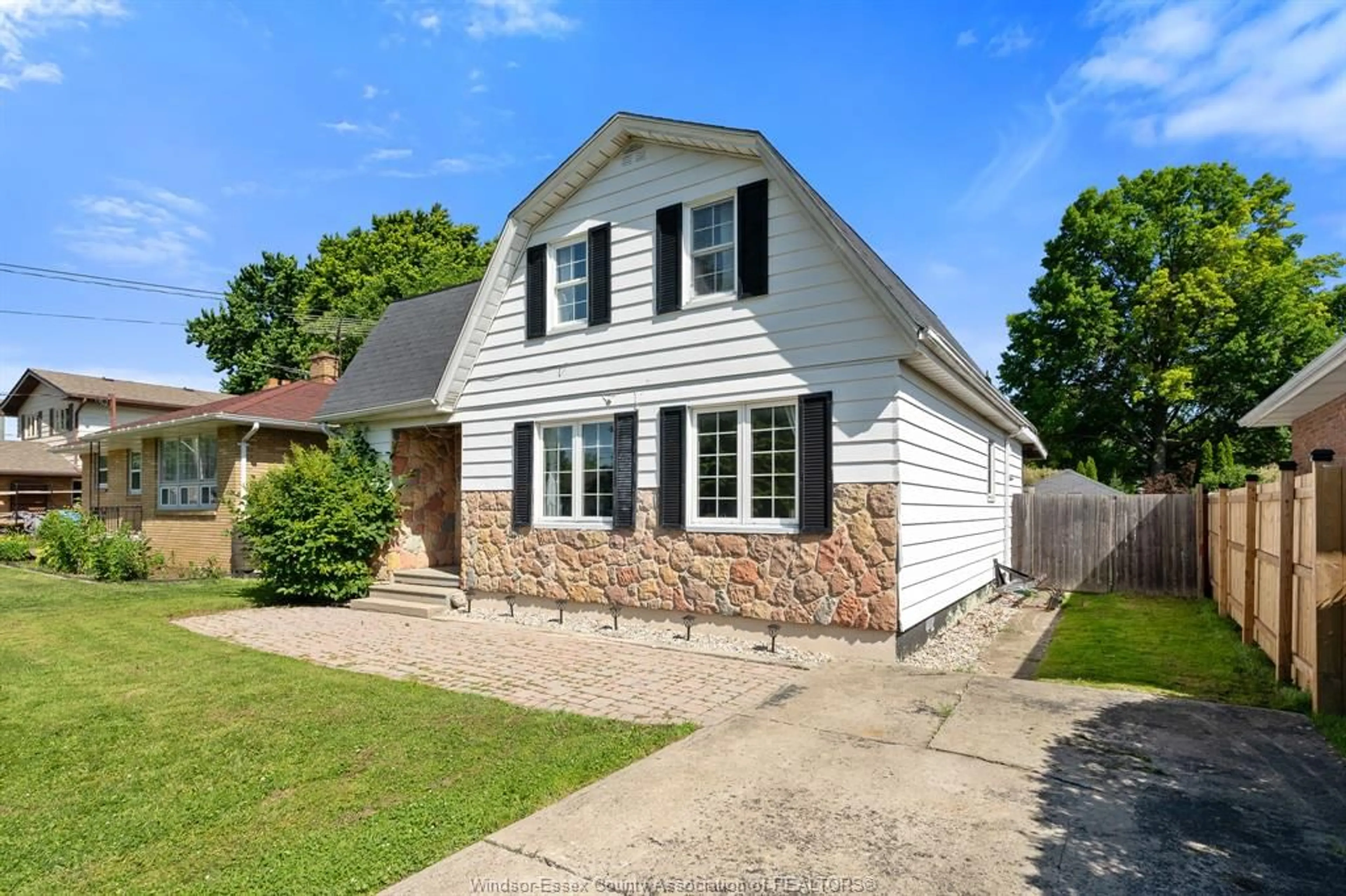 Home with vinyl exterior material, street for 12422 MCNORTON St, Tecumseh Ontario N8N 1J8