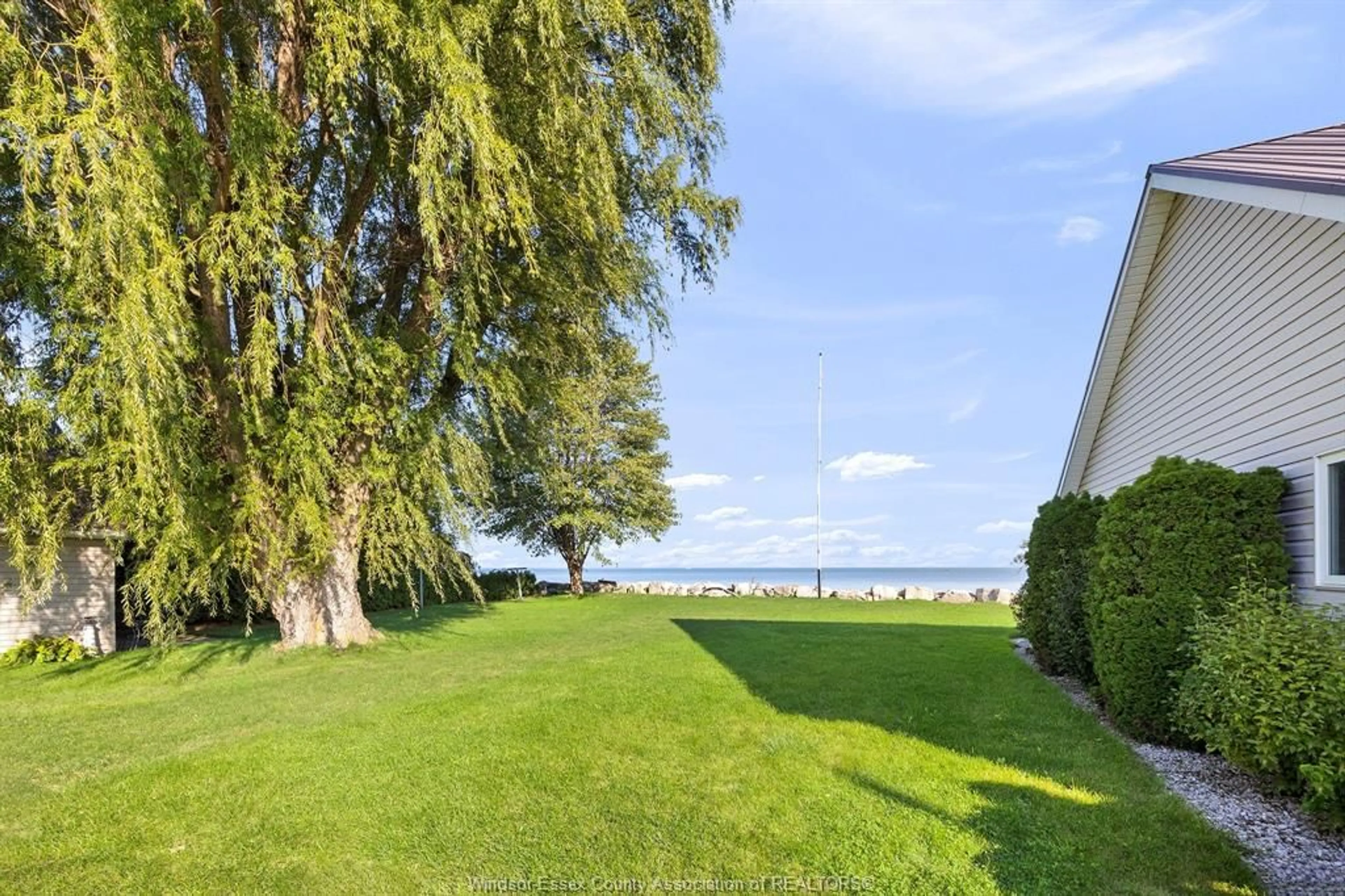 A pic from outside/outdoor area/front of a property/back of a property/a pic from drone, water/lake/river/ocean view for 15230 COUTURE BEACH, Lakeshore Ontario N0P 2L0