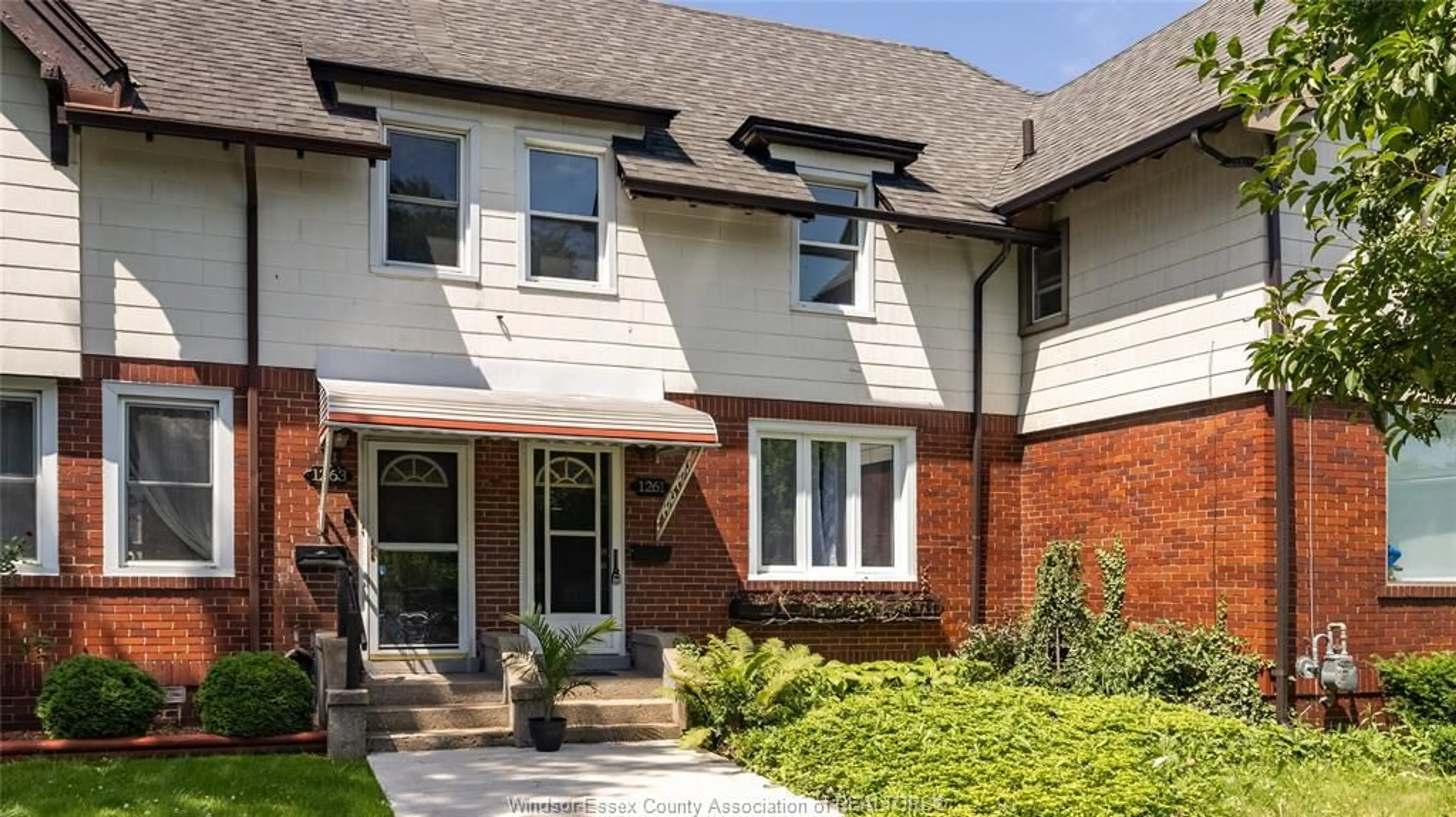Home with brick exterior material, street for 1261 MONMOUTH, Windsor Ontario N8Y 3M2