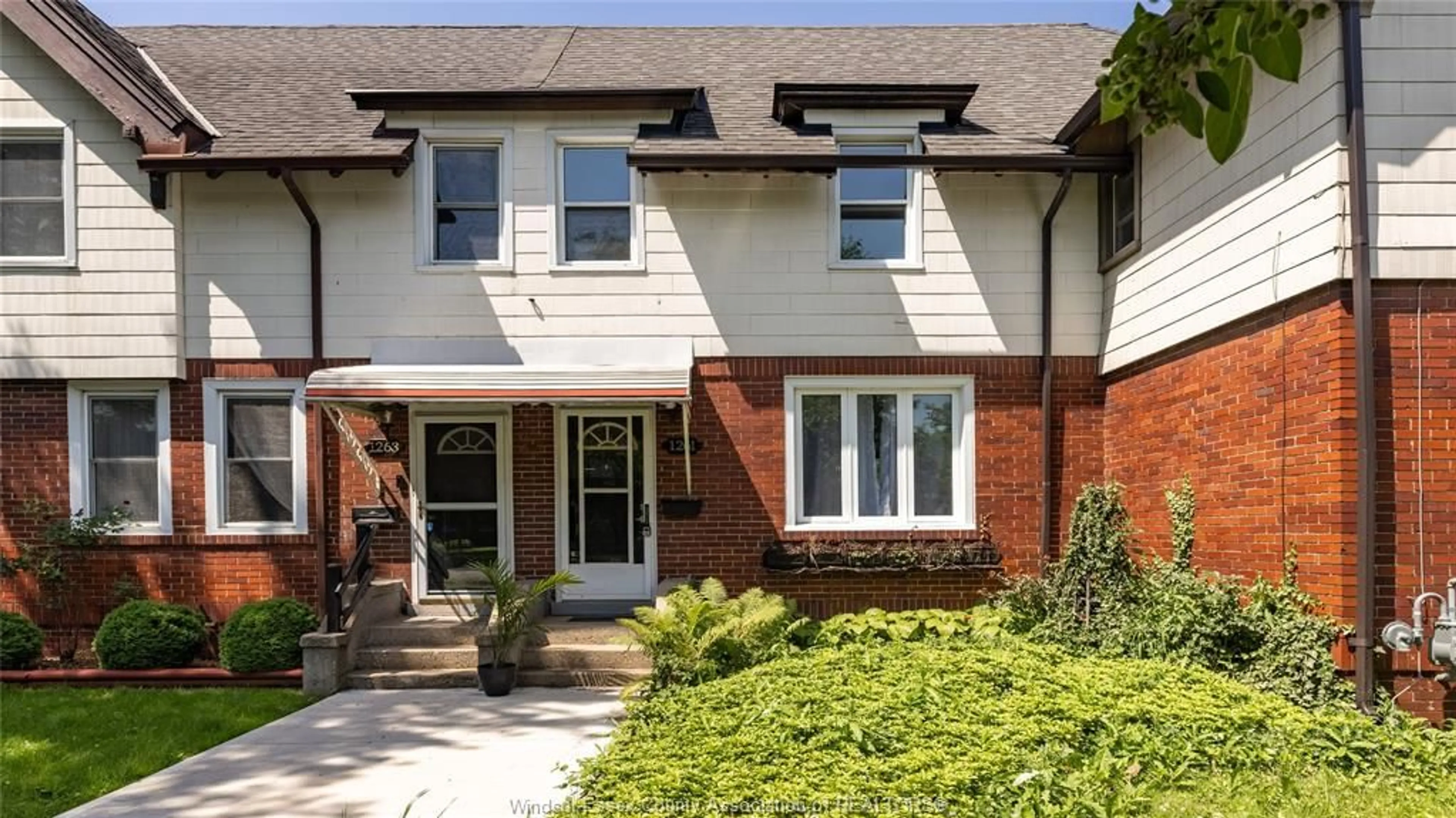 Home with brick exterior material, street for 1261 MONMOUTH, Windsor Ontario N8Y 3M2