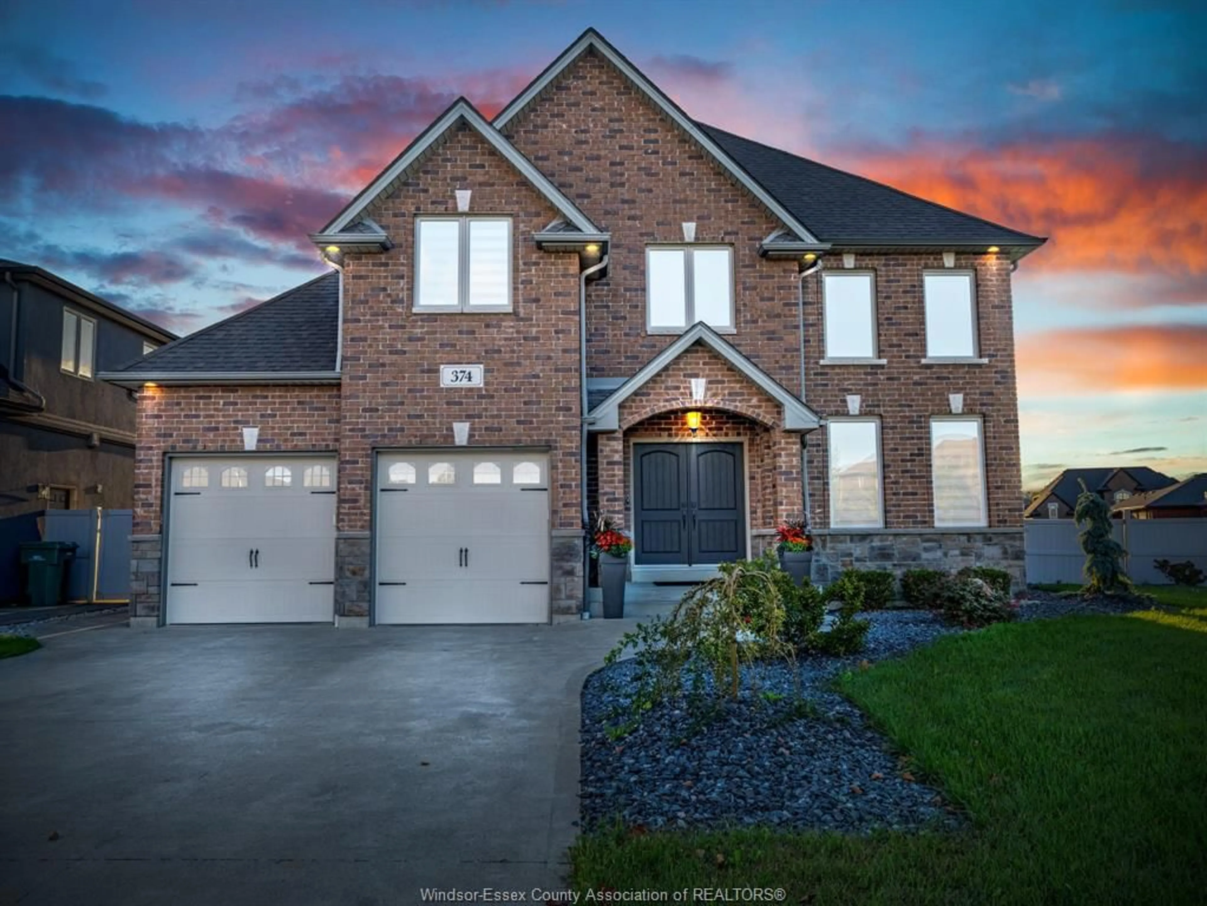 Home with brick exterior material, street for 374 POPLAR DRIVE, Lakeshore Ontario N8L 0X4