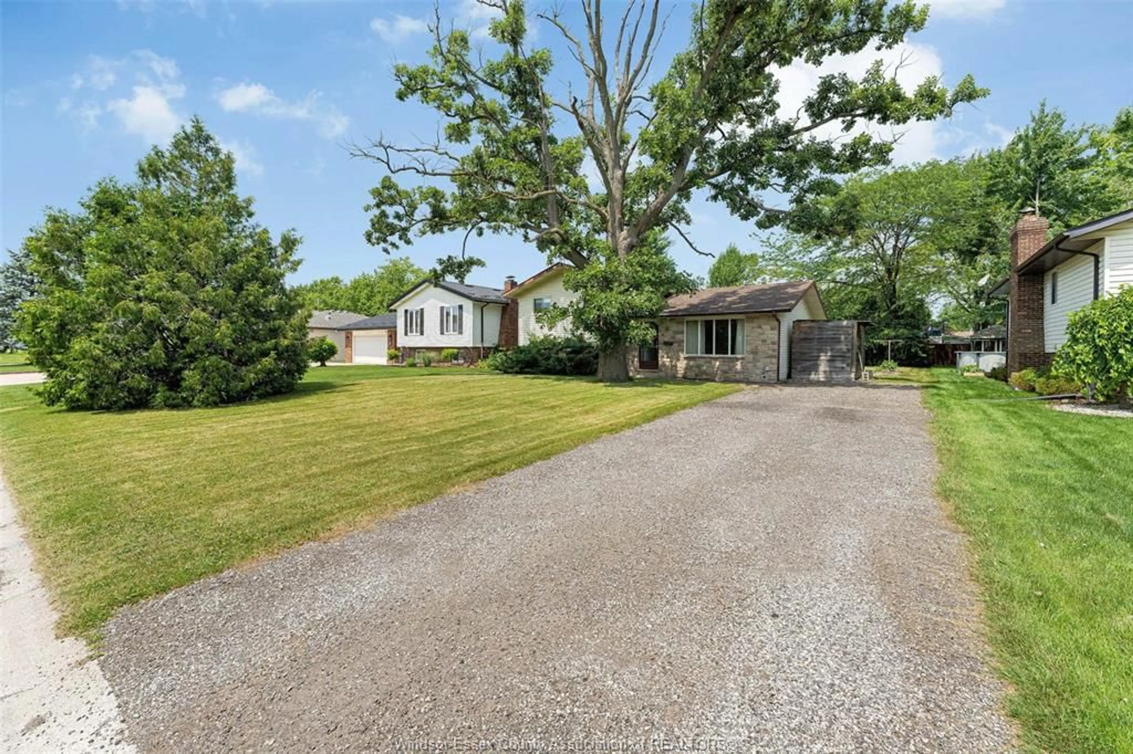 A pic from outside/outdoor area/front of a property/back of a property/a pic from drone, street for 39 REDWOOD, Cottam Ontario N0R 1B0