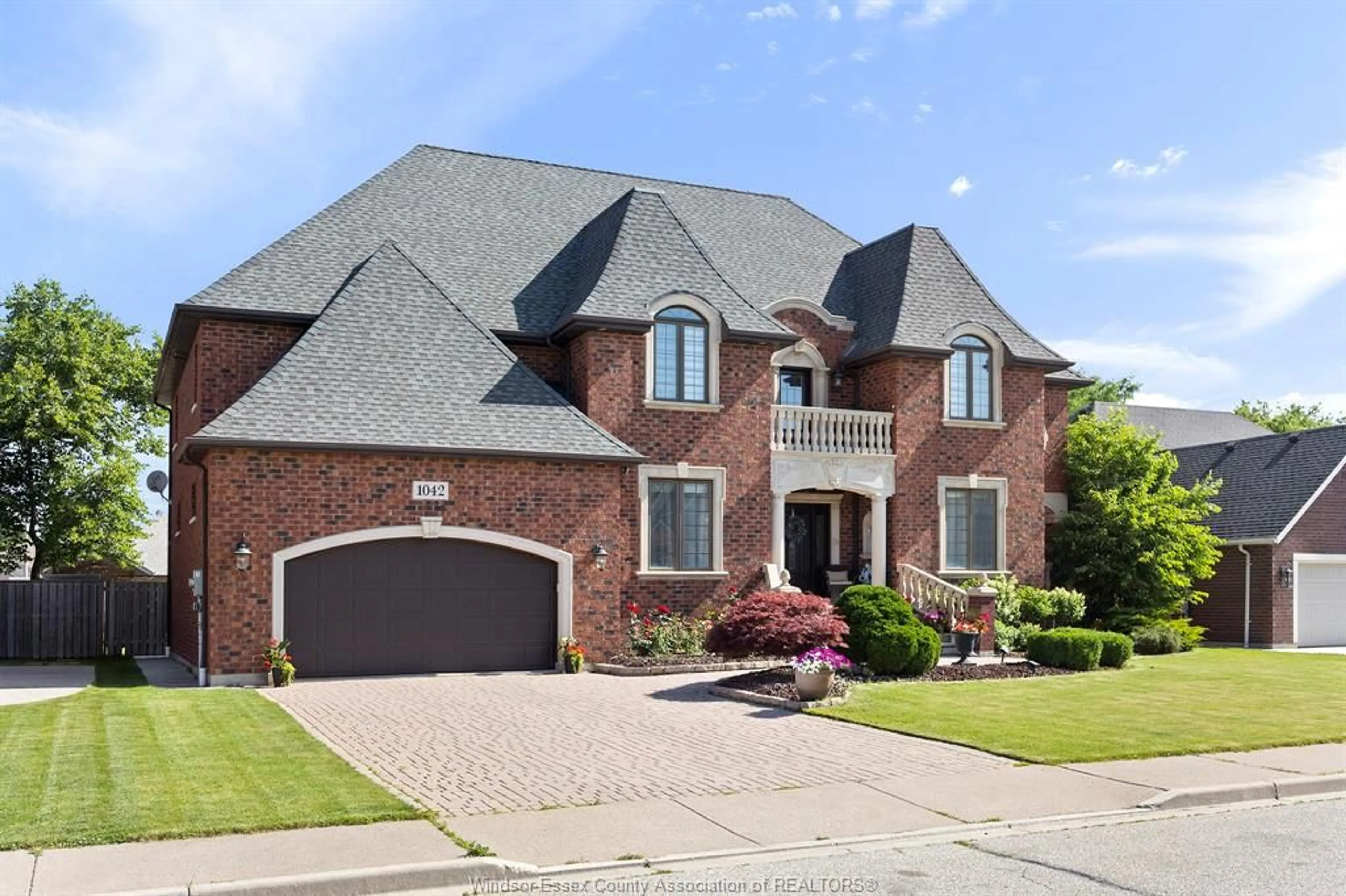 Home with brick exterior material, street for 1042 HUNTINGTON Blvd, Lakeshore Ontario N8L 0W2