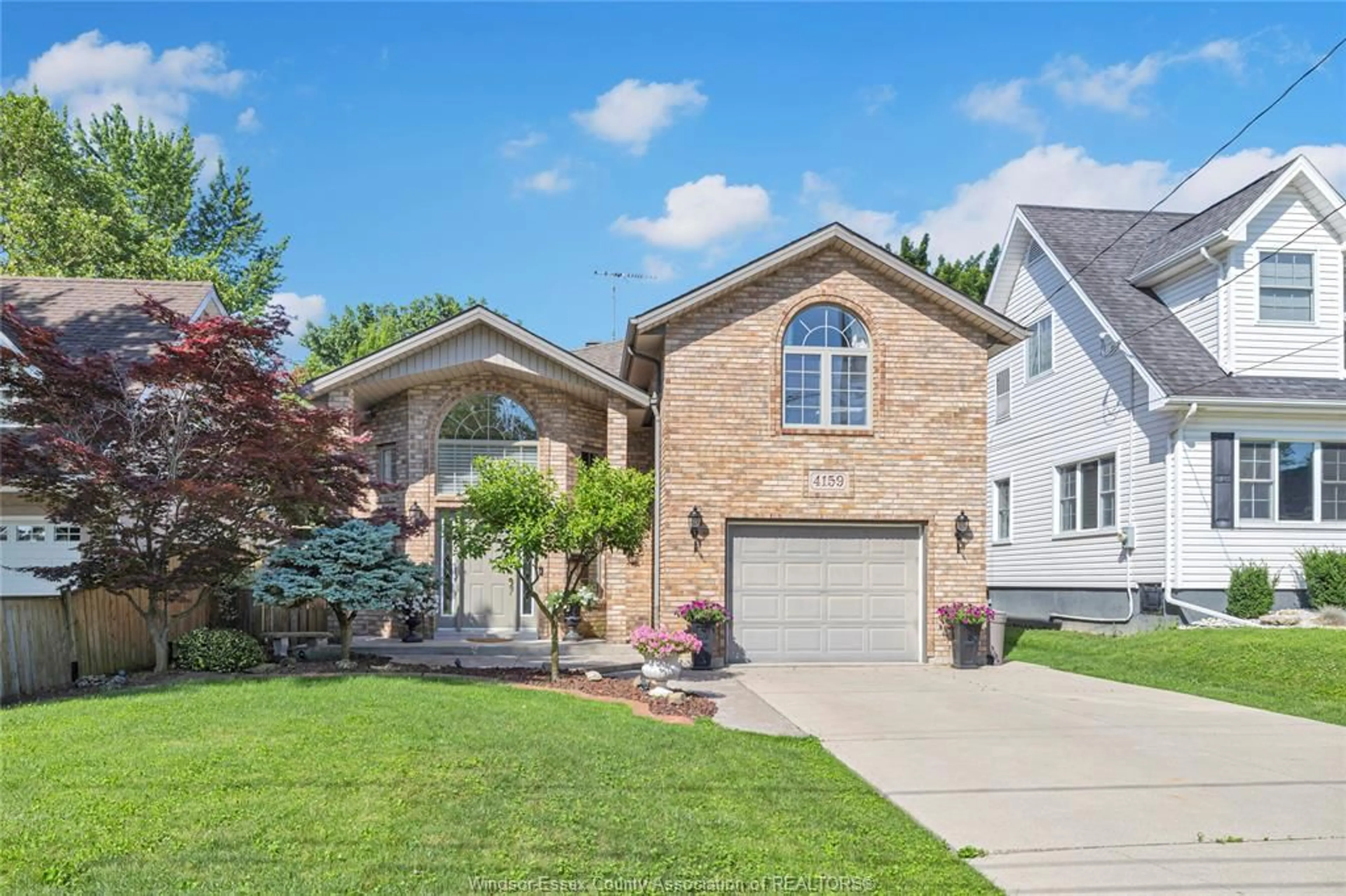 Home with brick exterior material, street for 4159 ROSELAND Dr, Windsor Ontario N9G 1Y5